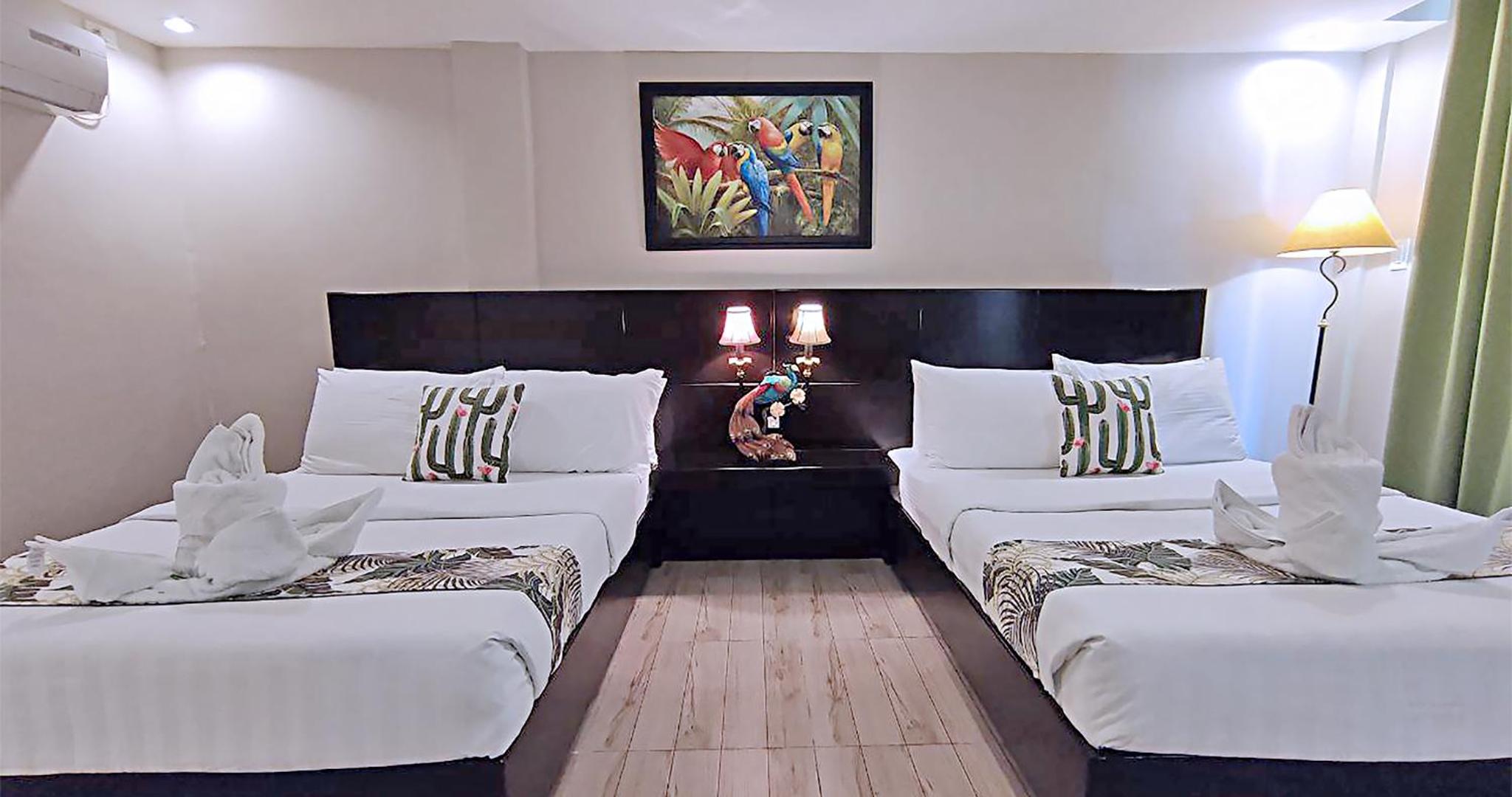 Quadruple Room with Balcony - Photo 1