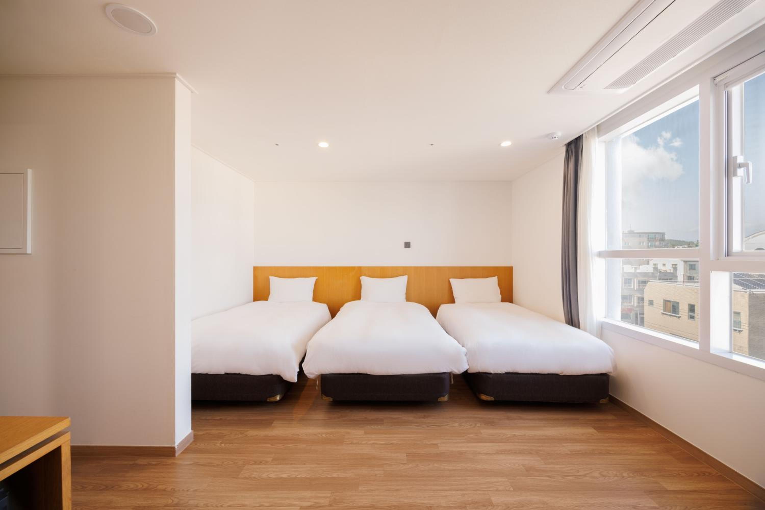 Deluxe Triple Room - Photo 1
