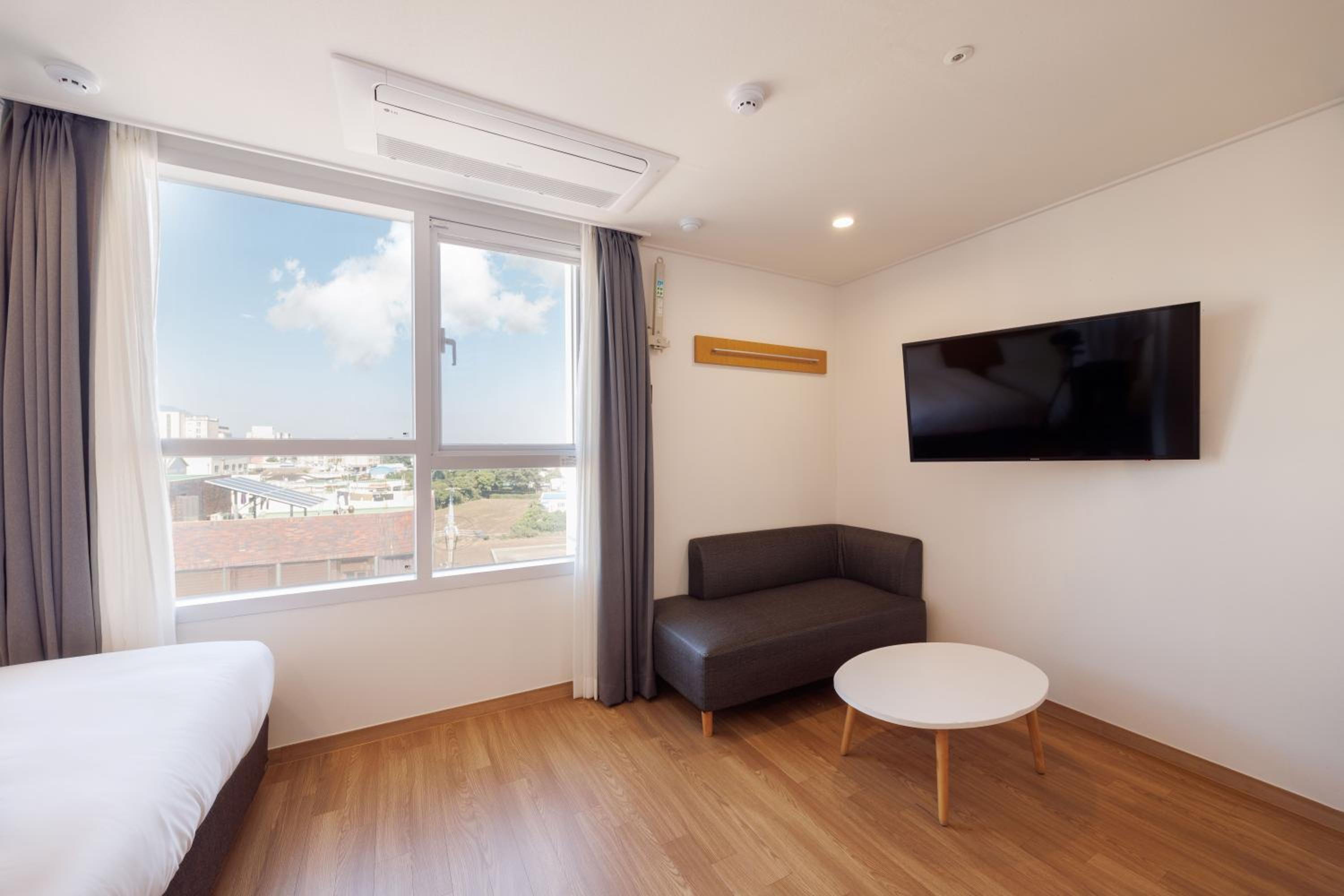 Deluxe Triple Room - Photo 6