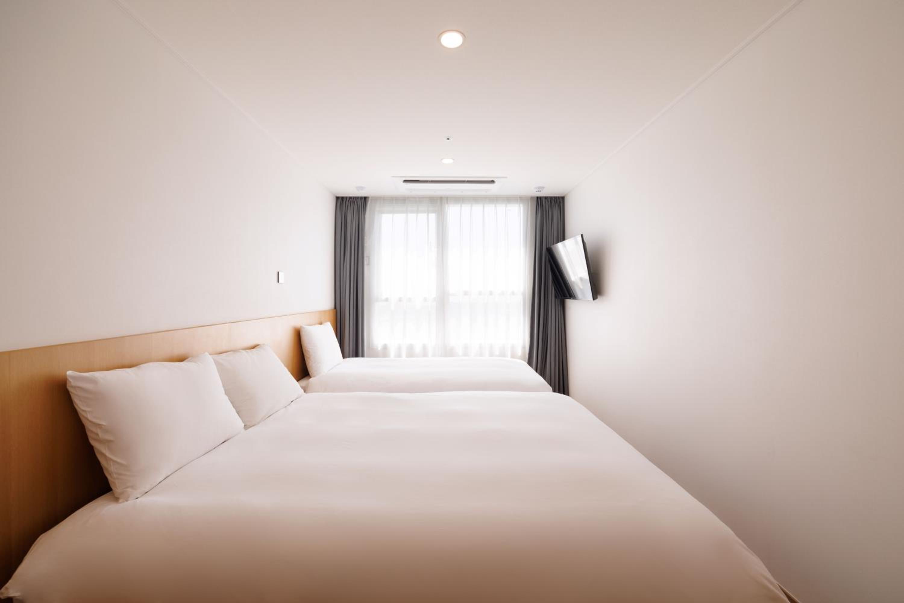 Deluxe Twin Room - Photo 7