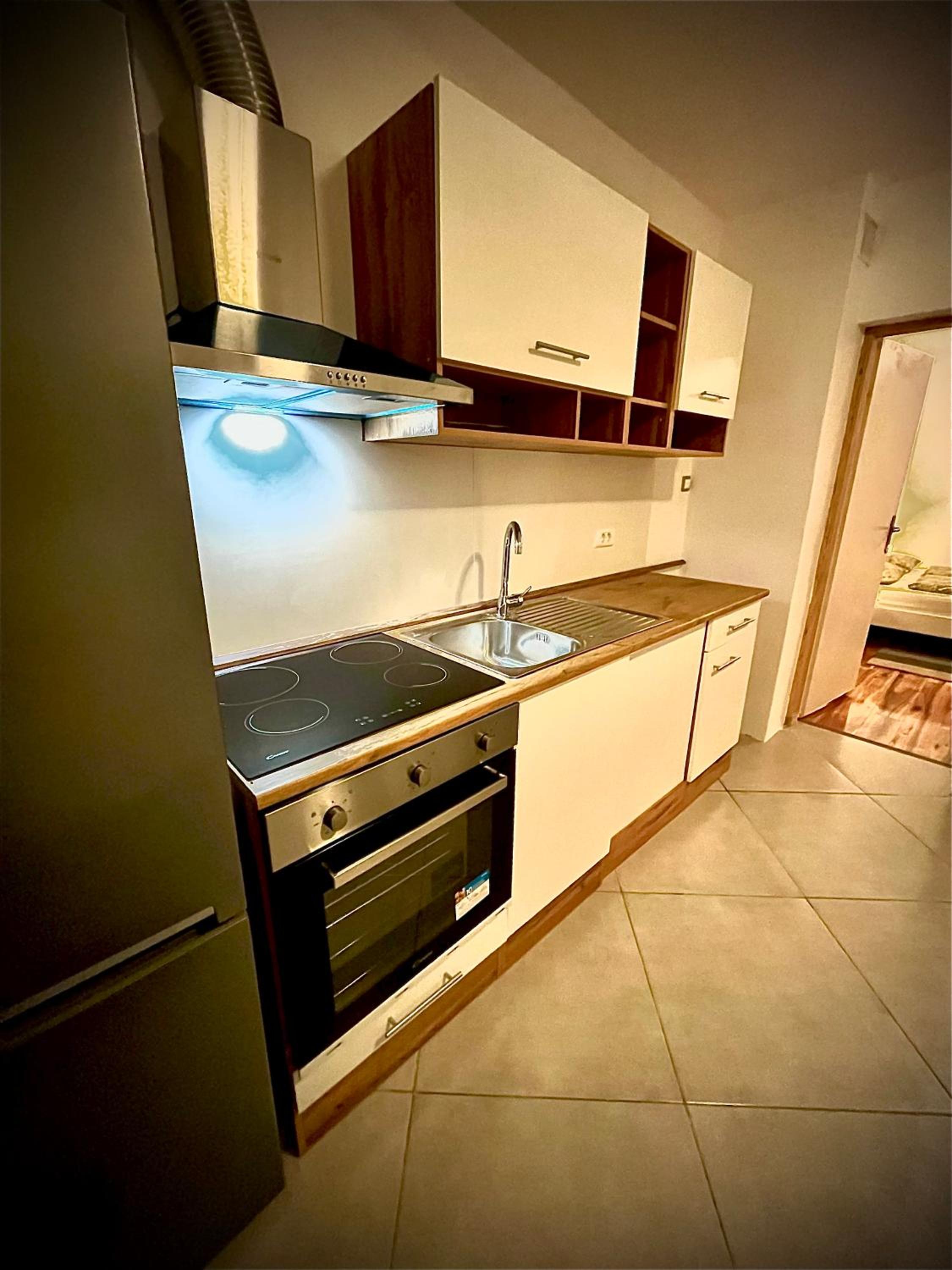 Apartment with Balcony - Photo 2