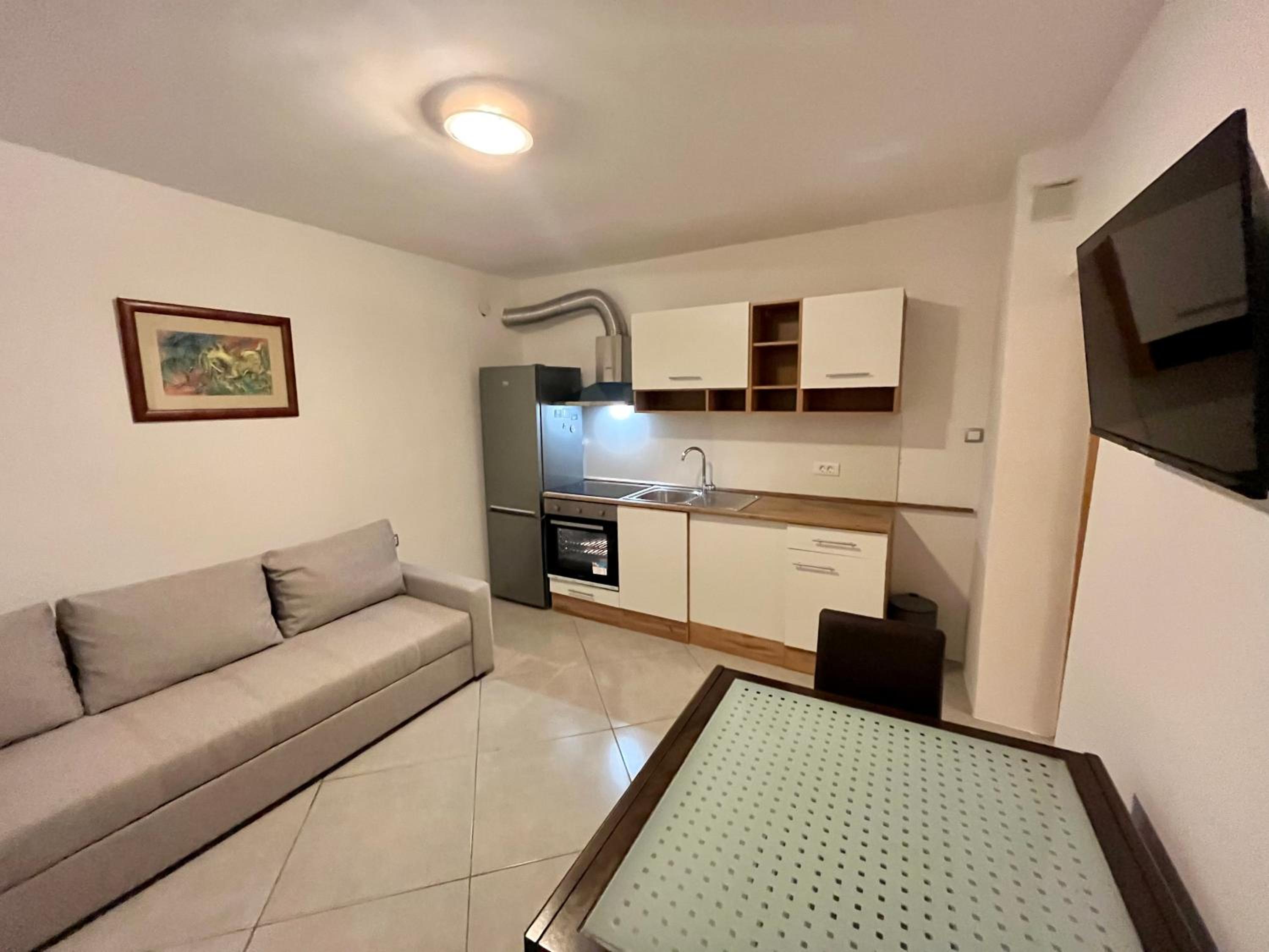 Apartment with Balcony - Photo 3