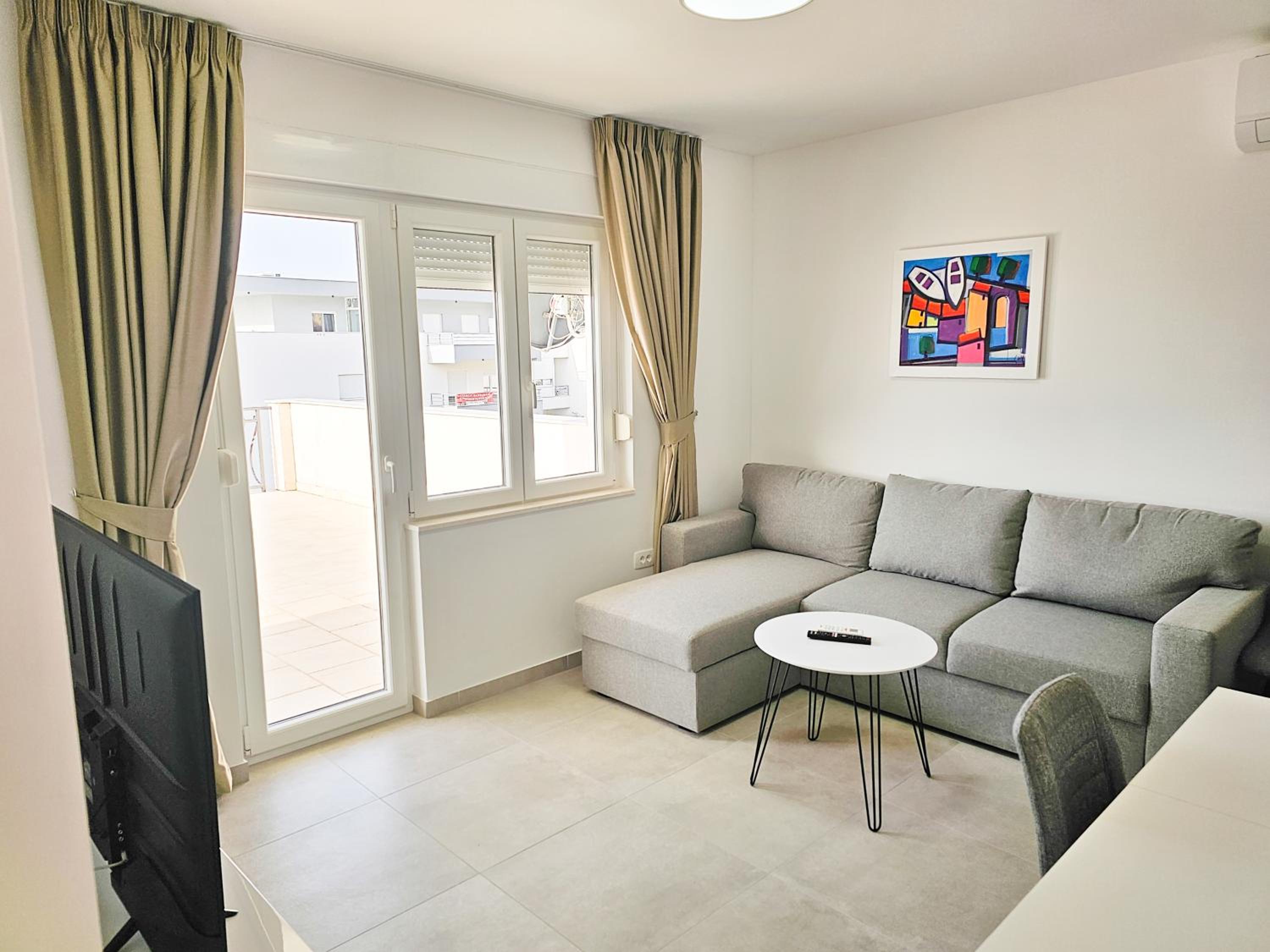 Two-Bedroom Apartment with Balcony and Sea View