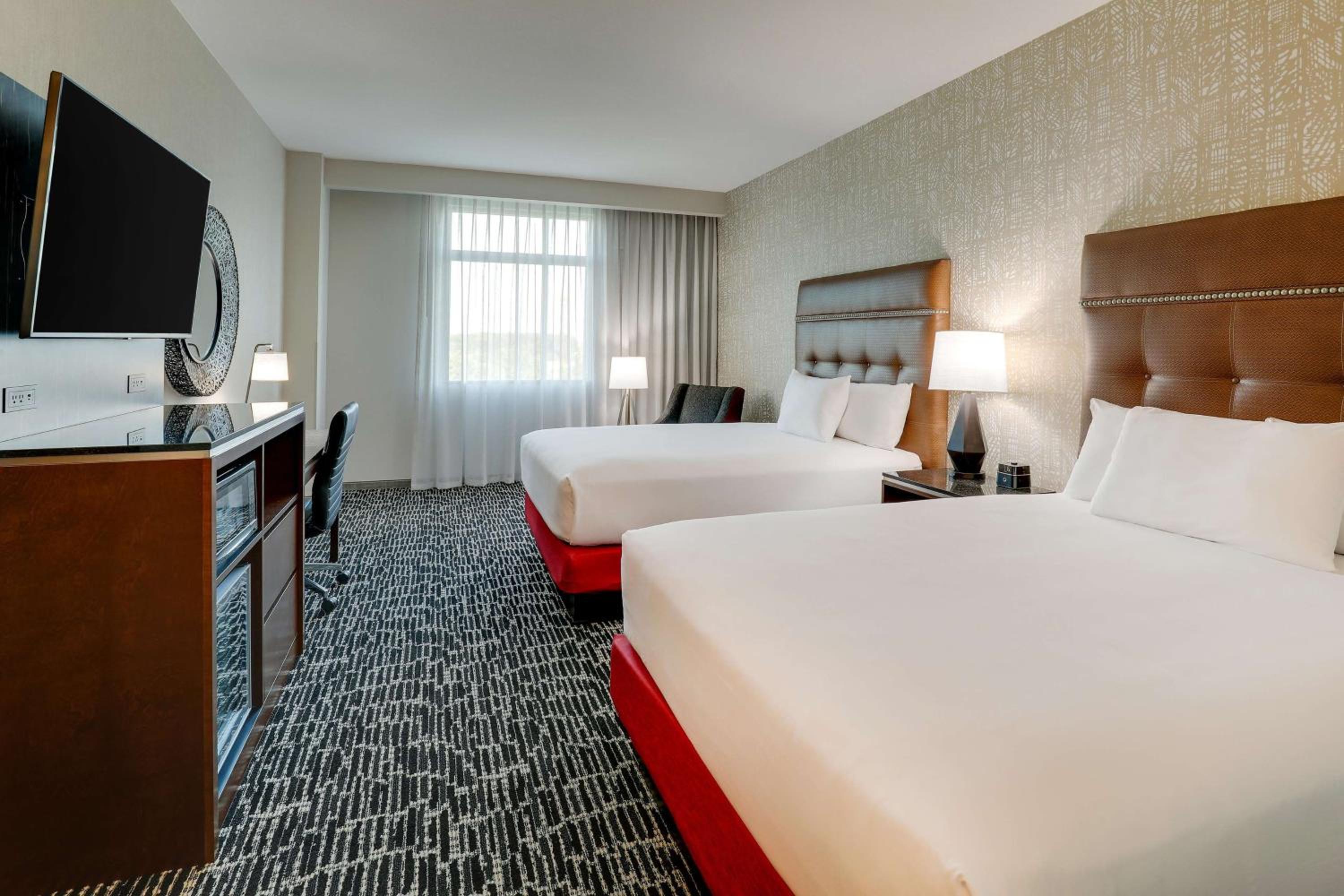Upper Floor Deluxe Queen Room with Two Queen Beds photo 1