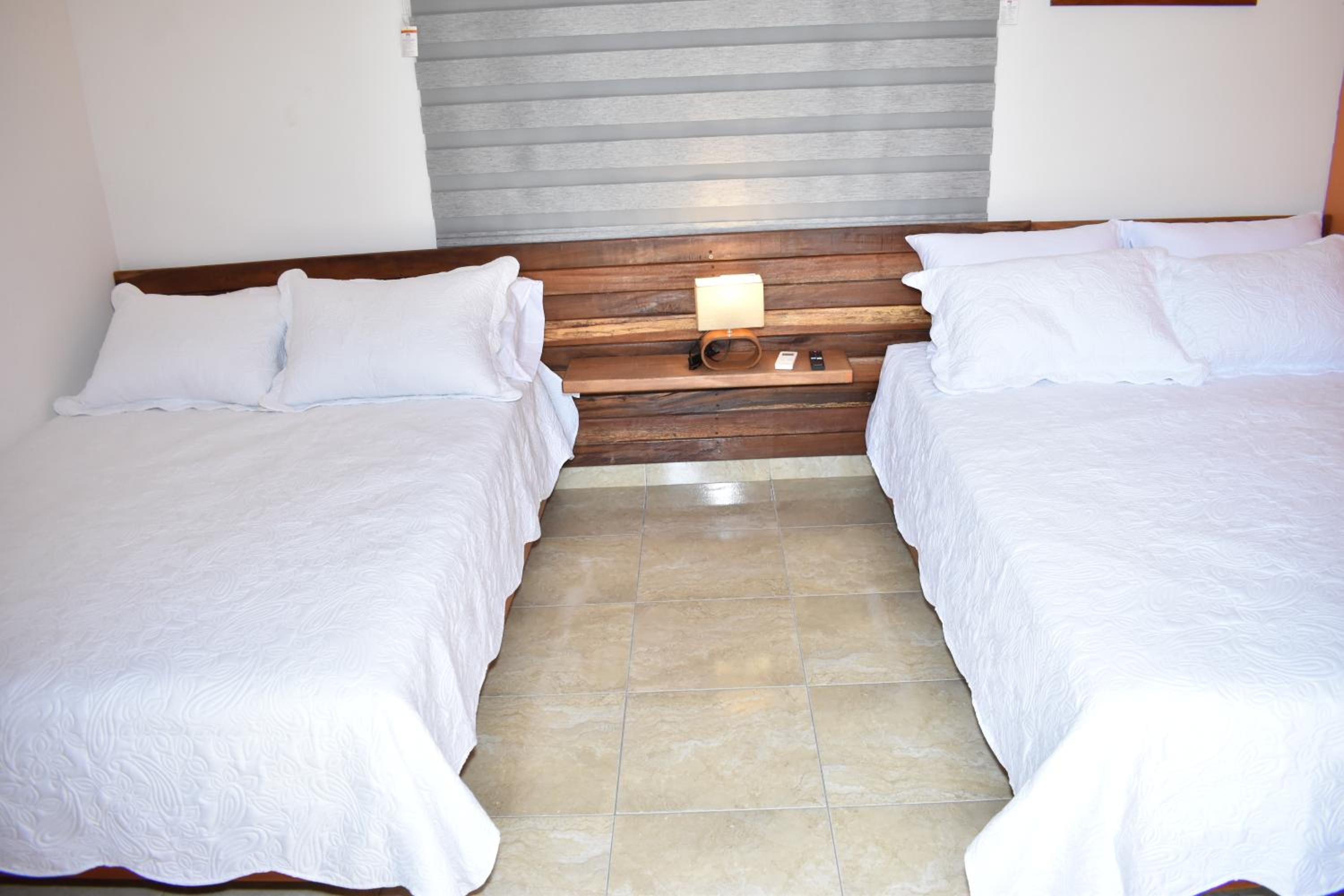 Economy Quadruple Room With Shared Bathroom