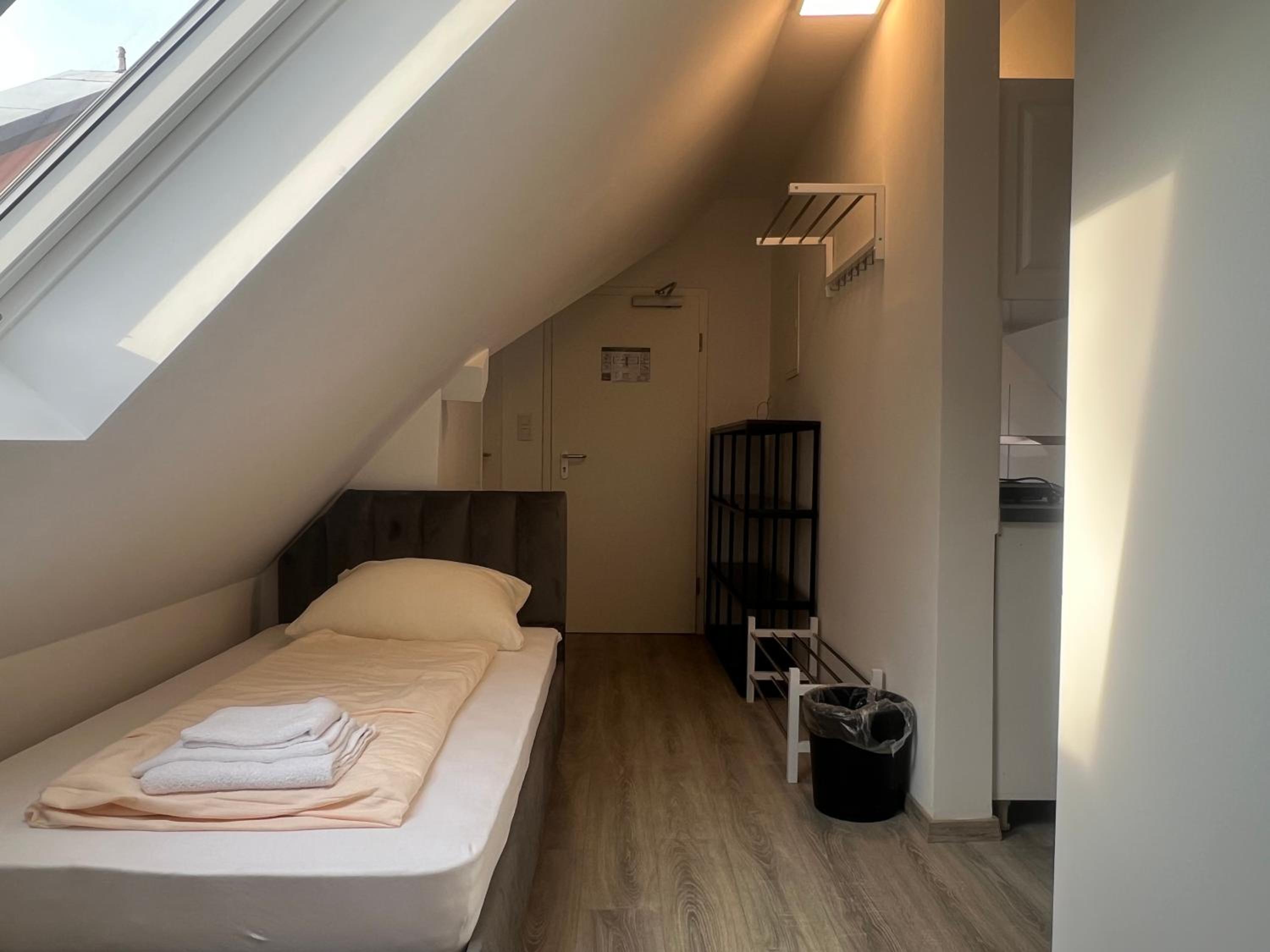 Dreibettzimmer mit Küche
