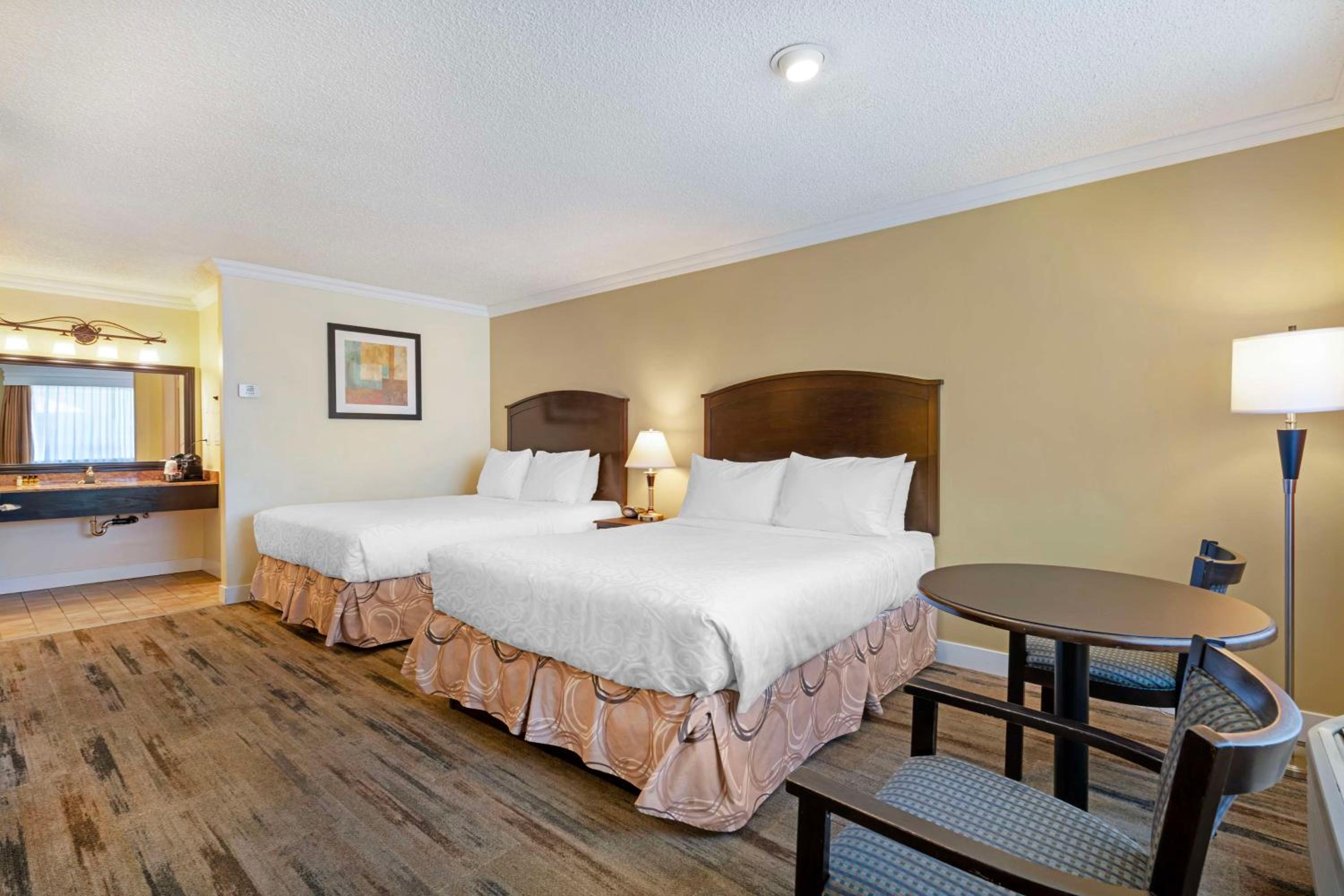 Queen Room with Two Queen Beds - Photo 1