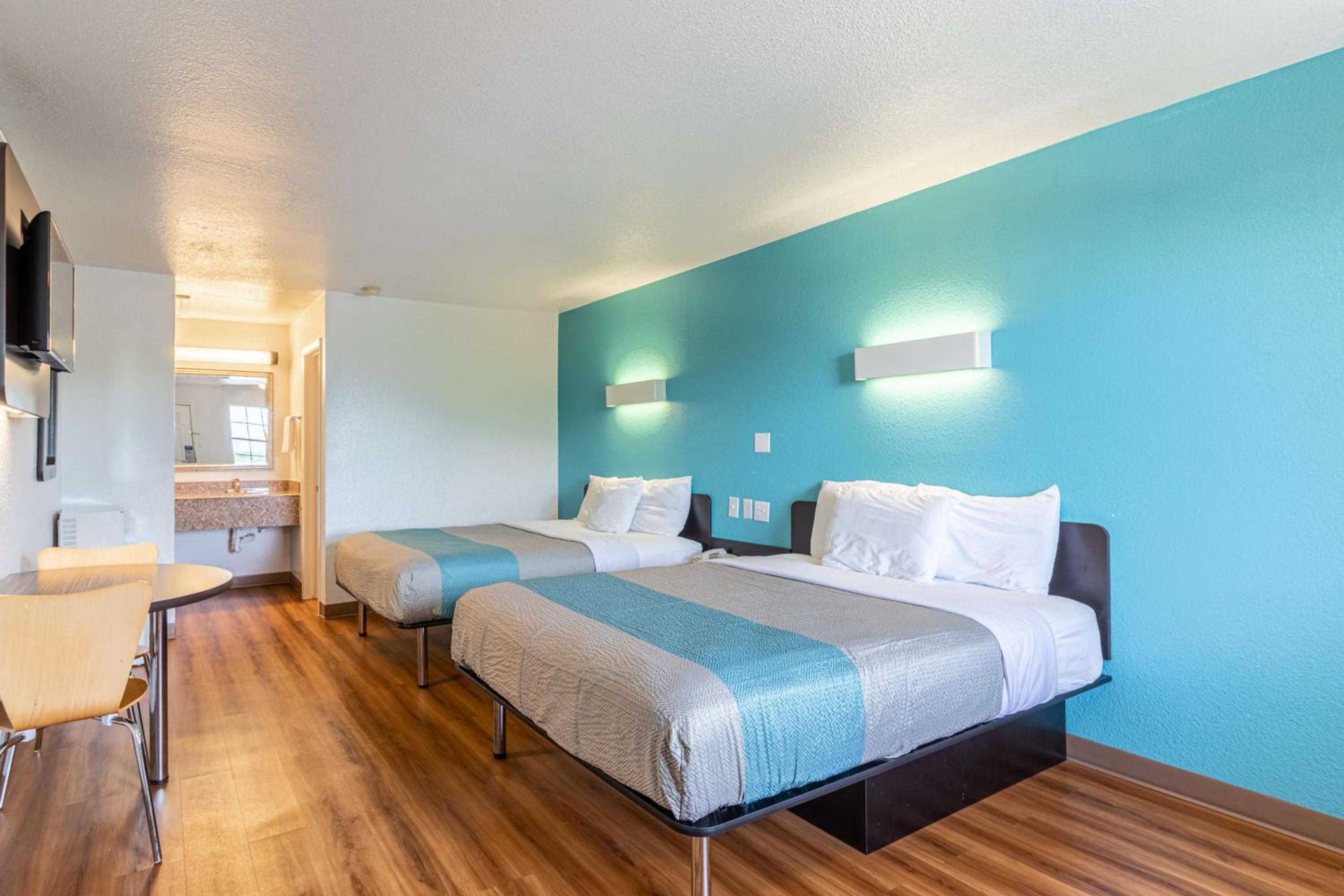 Deluxe Queen Room with Two Queen Beds - Non-Smoking photo 1
