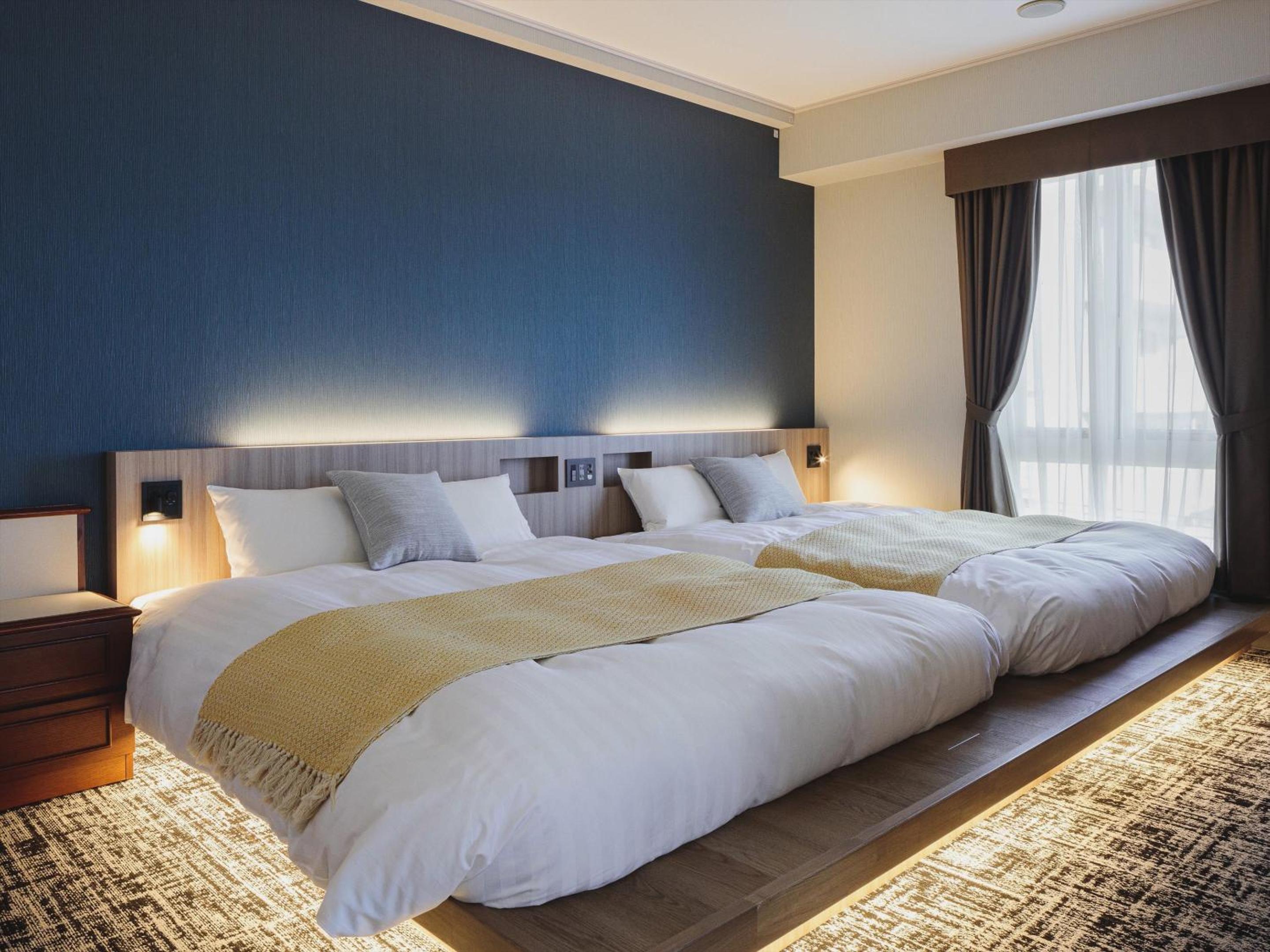Deluxe Queen Room with Two Queen Beds photo 1
