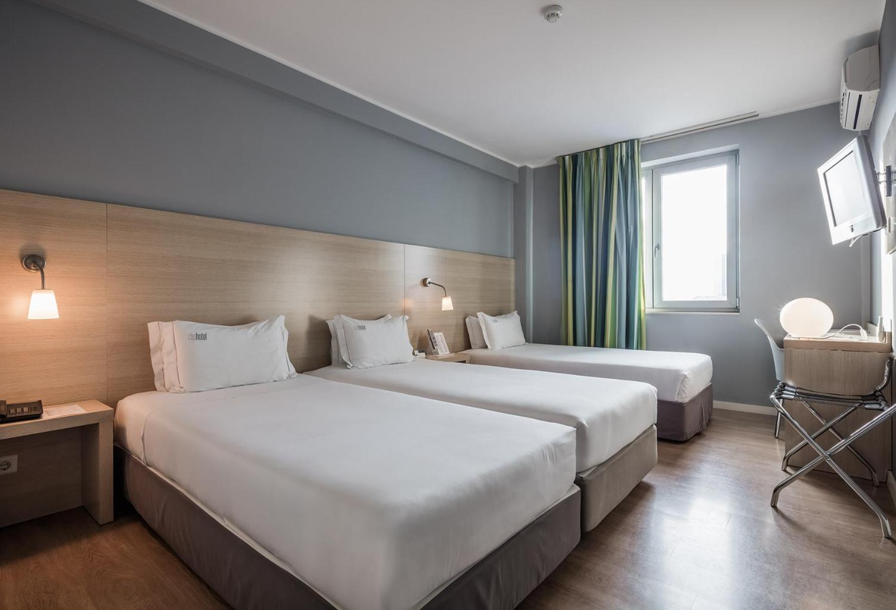 Triple Room - Photo 1