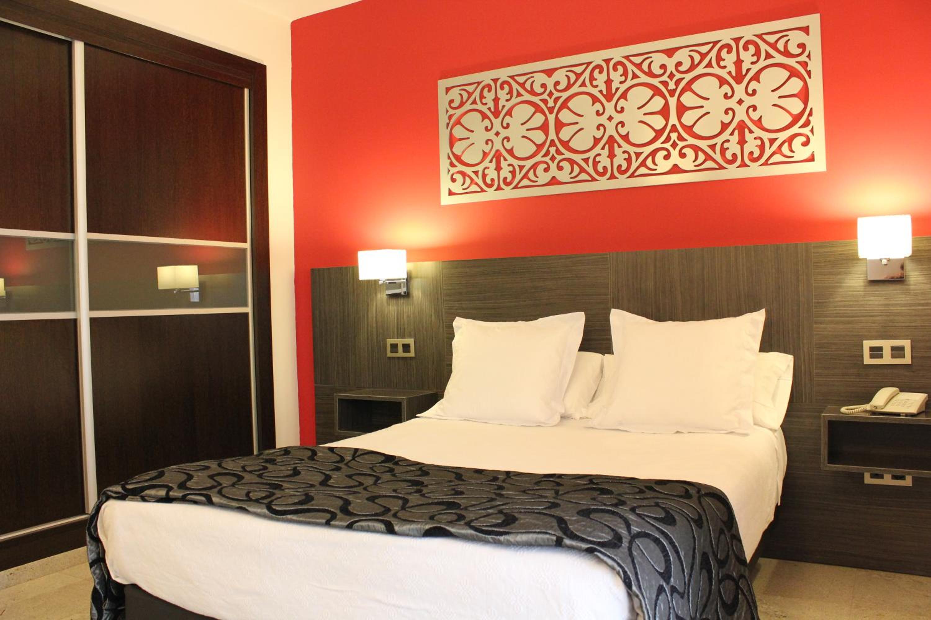 Habitación Estándar con Cama Queen