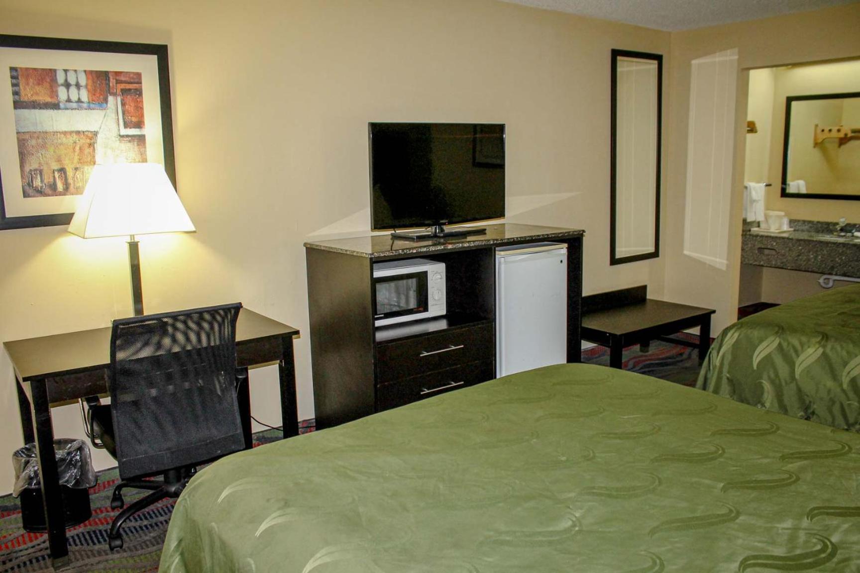Deluxe Queen Room with Two Queen Beds - Photo 1