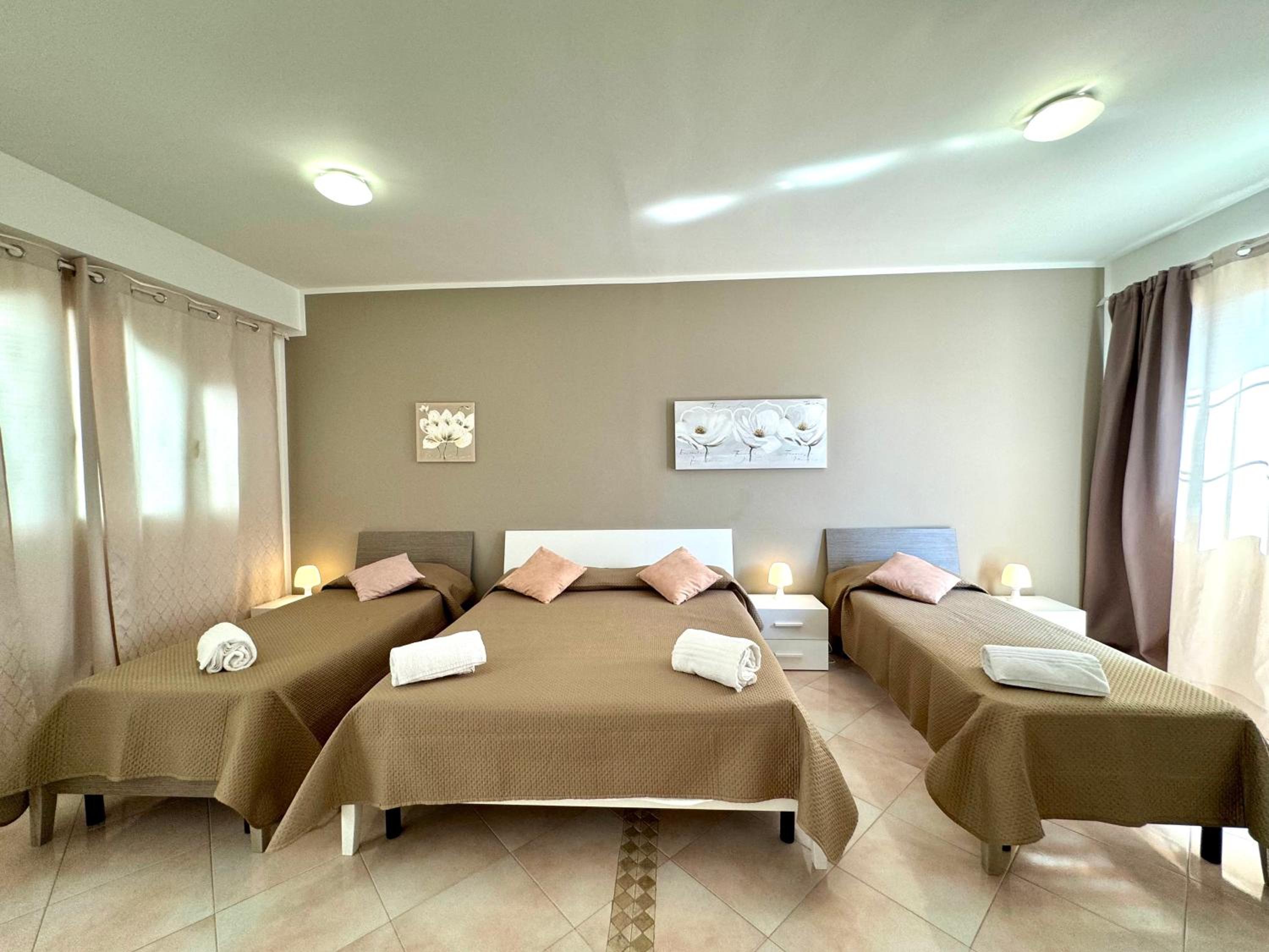 Quadruple Room with Private Bathroom photo 3