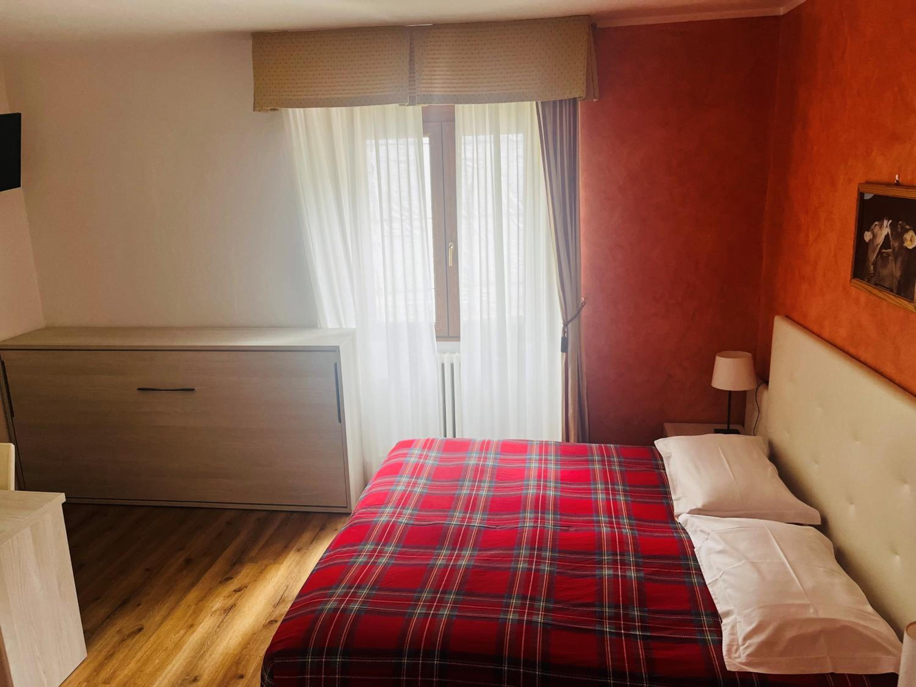Quadruple Room - Photo 1