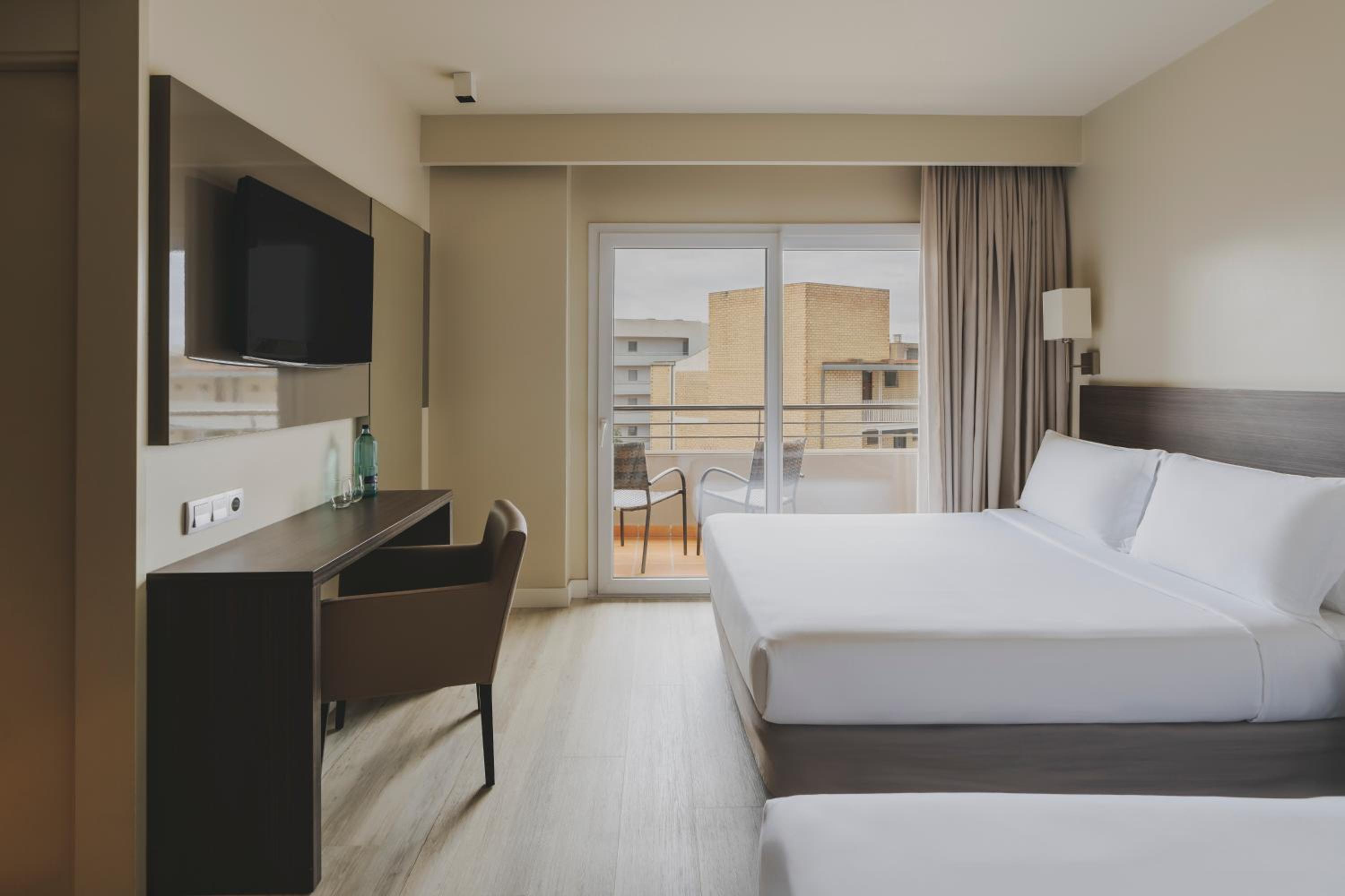 Triple Room with Pool View (2 Adults + 1 Child) with sofa bed