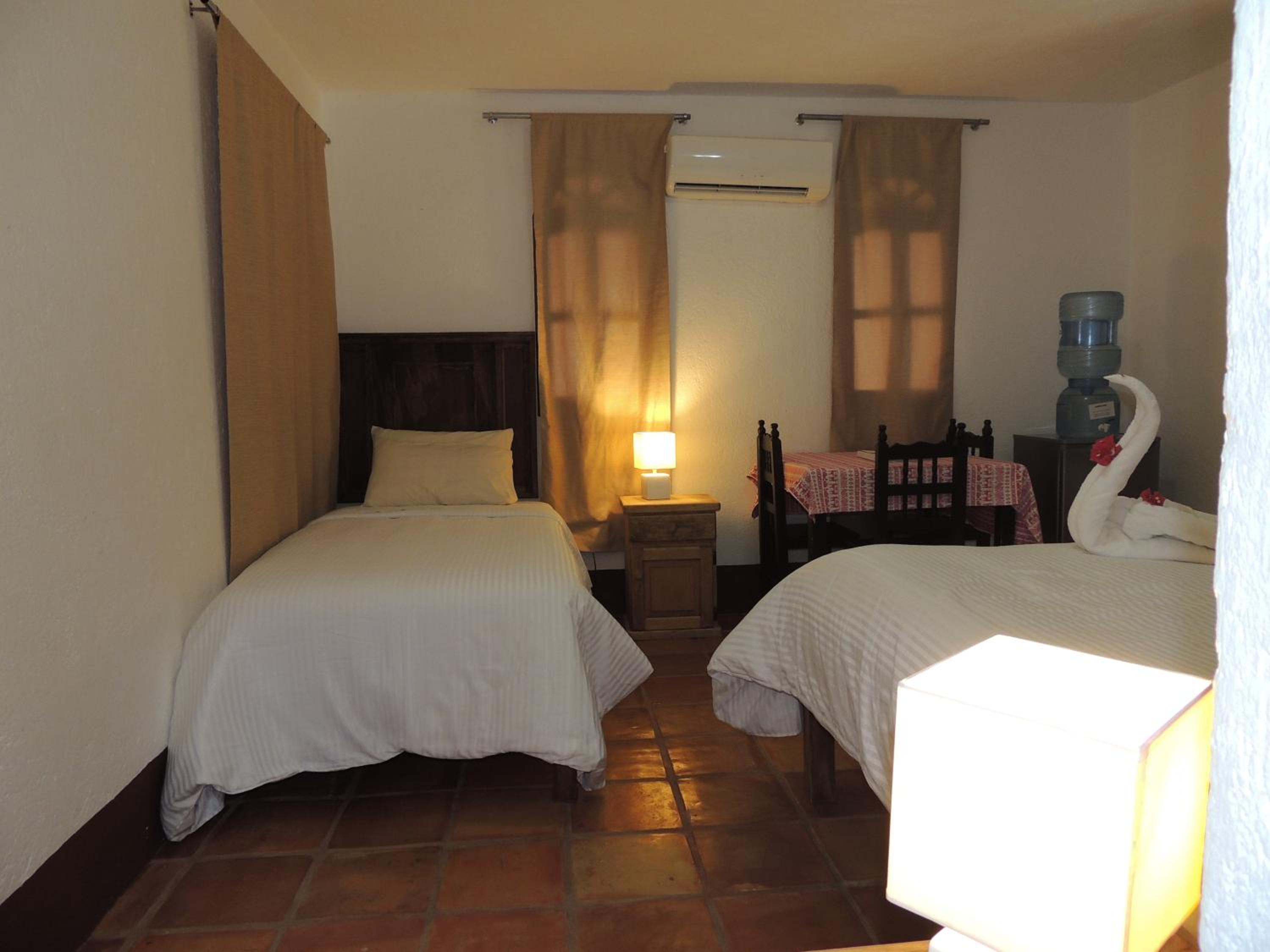 Economy Quadruple Room - Photo 25