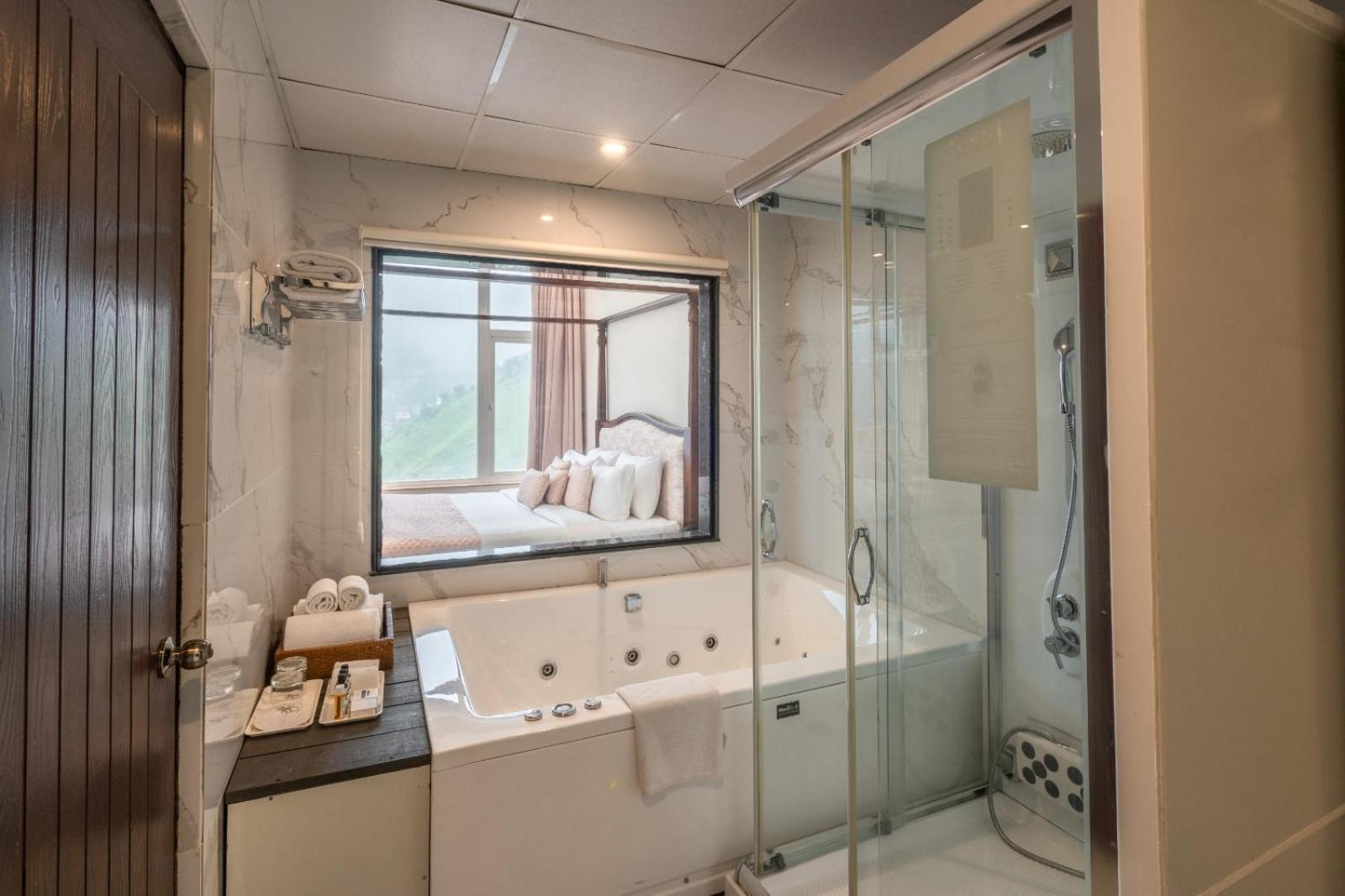 Orchid Suite - Bathtub with Jacuzzi & Hydrotherapy Shower - Photo 7