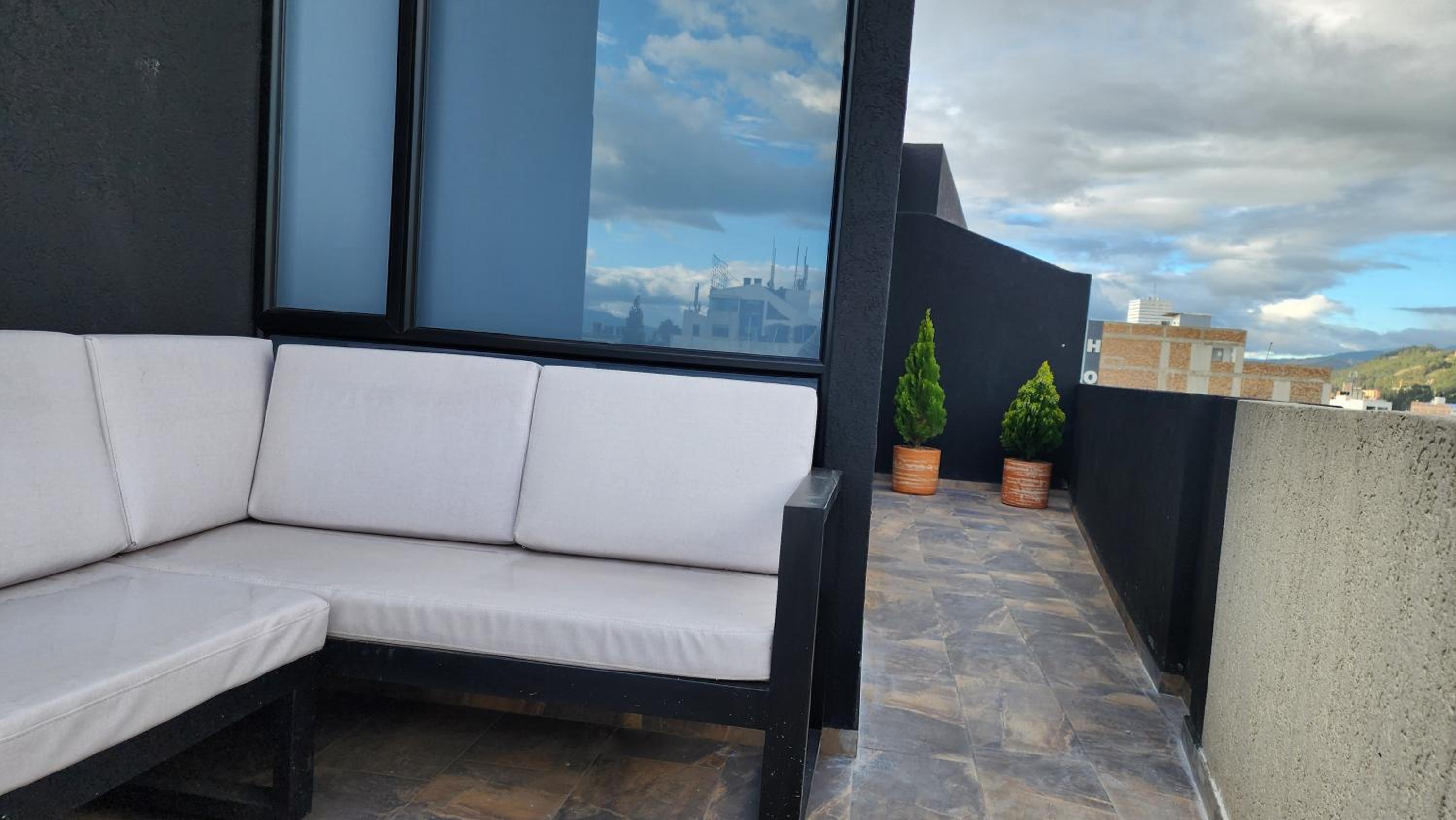 Two-Bedroom Apartment with Balcony and Terrace photo 3