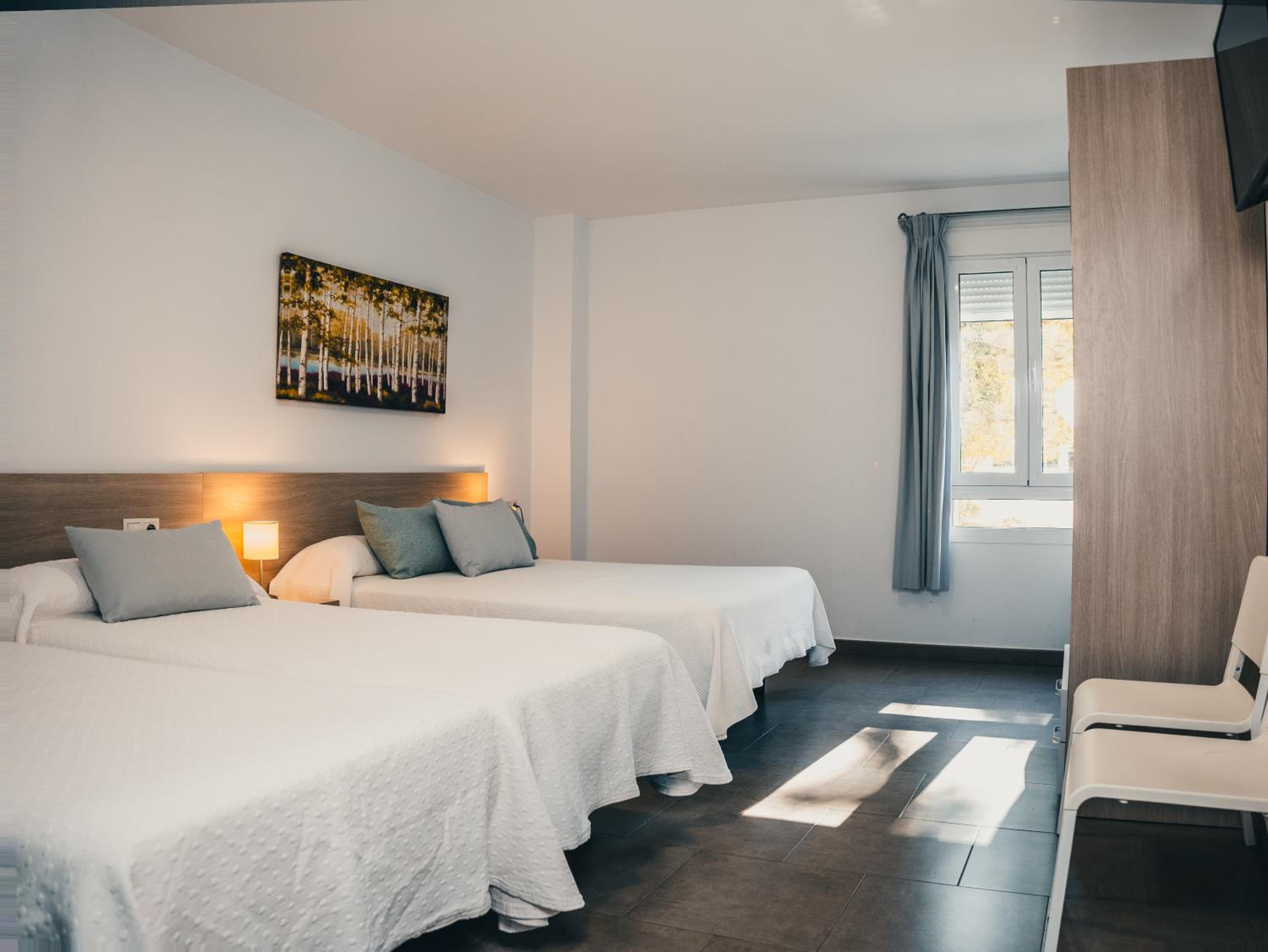 Quadruple Room with Private Bathroom - Photo 1