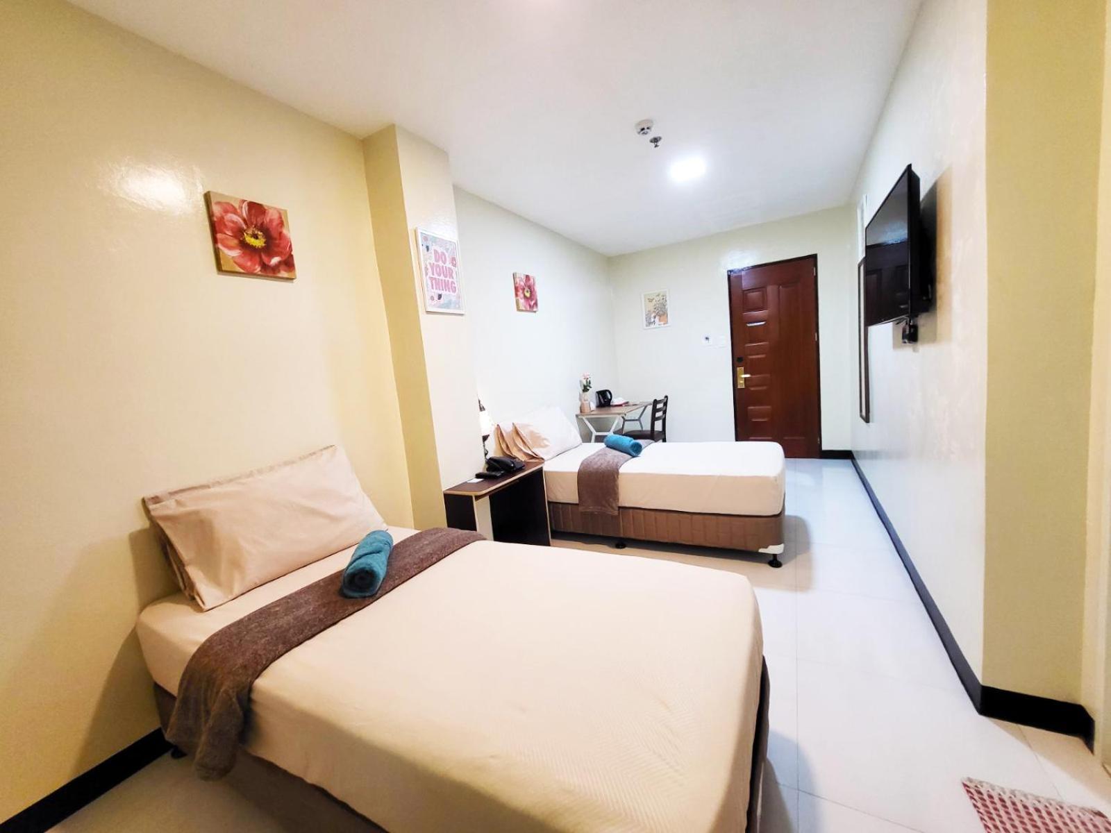 Standard Twin Room - Photo 4