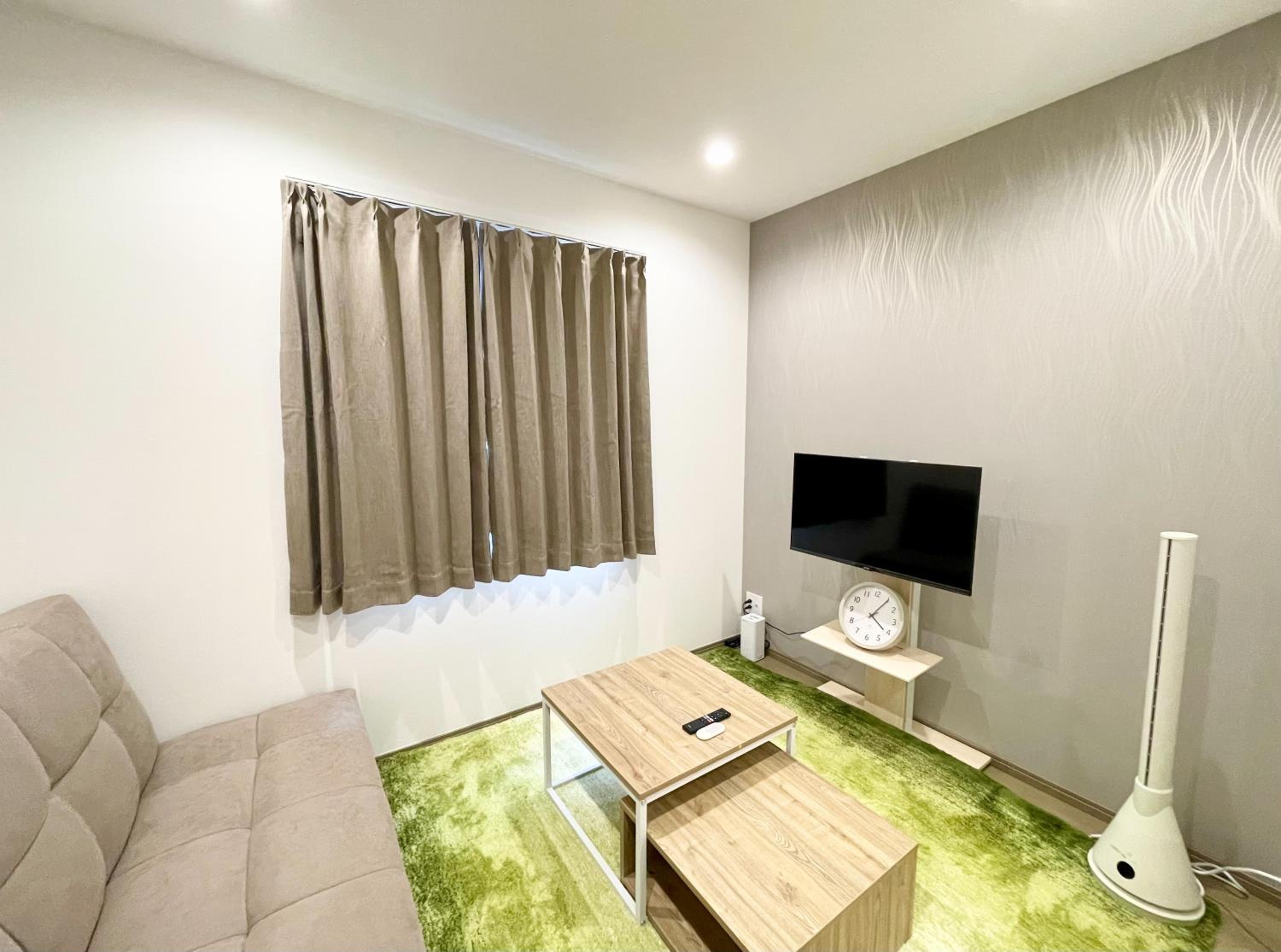 Three-Bedroom Apartment photo 1