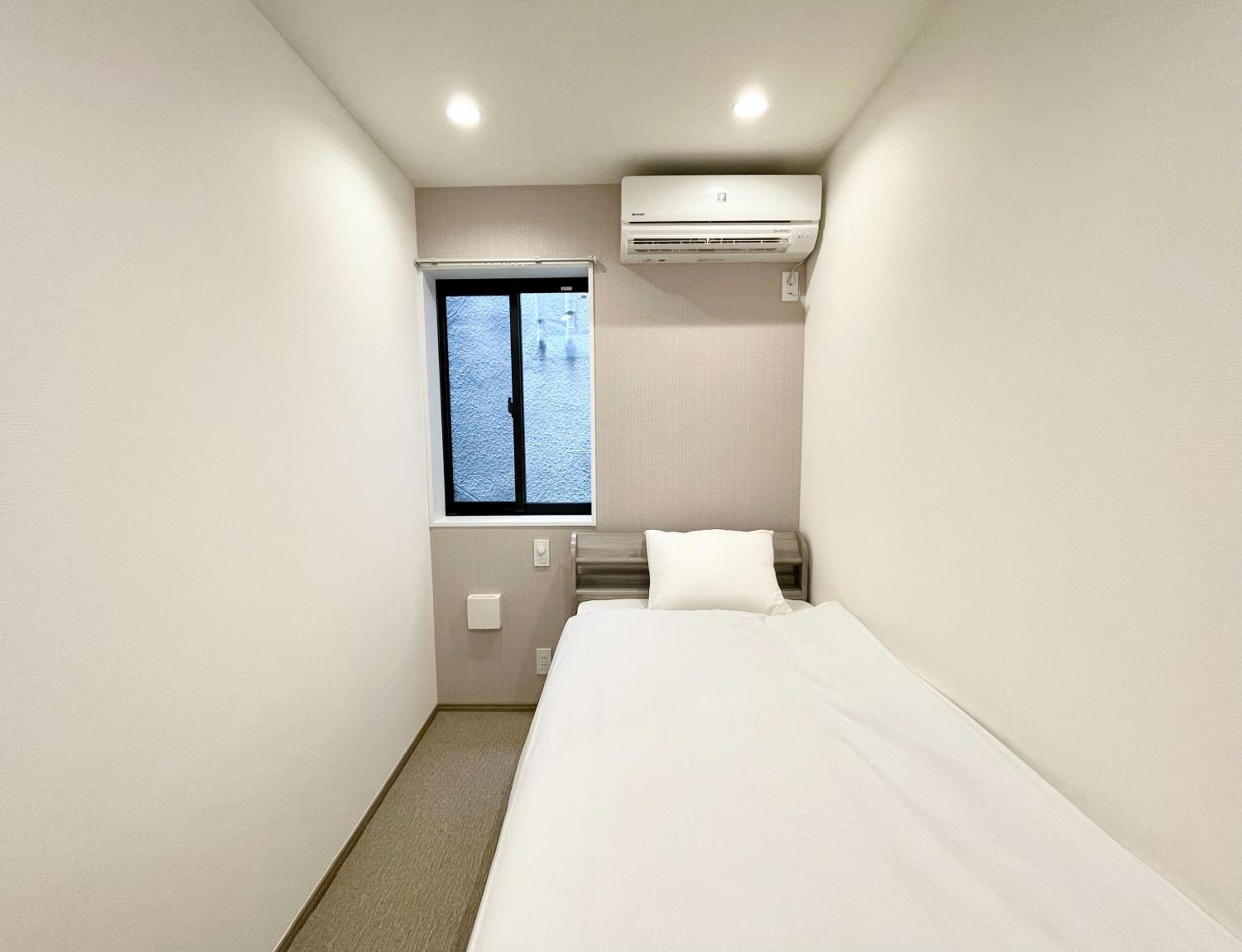Three-Bedroom Apartment photo 2