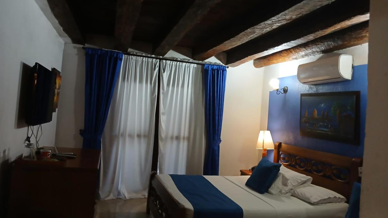 Deluxe Room with Balcony - Photo 3
