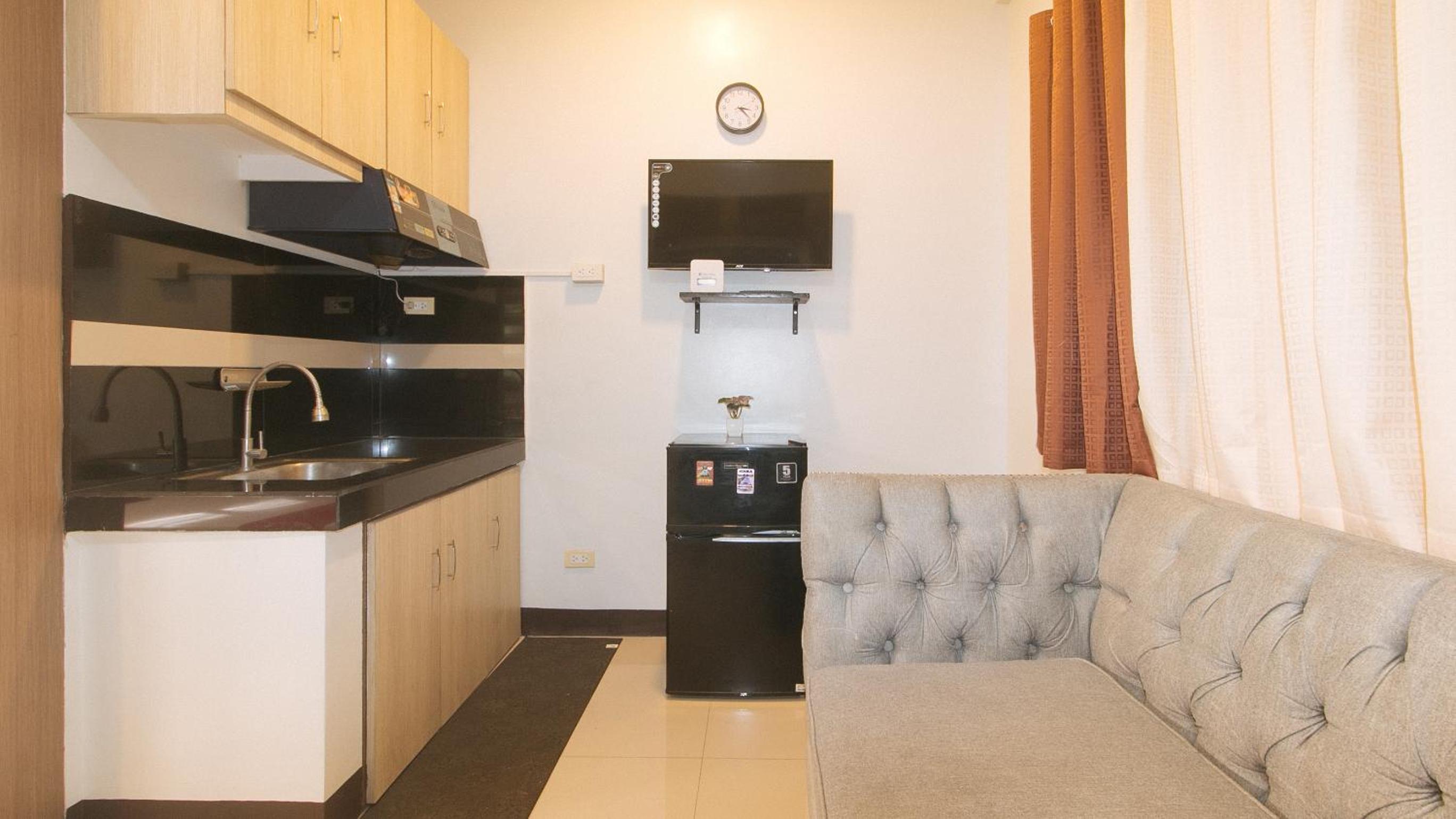 Deluxe Triple Room - Photo 12