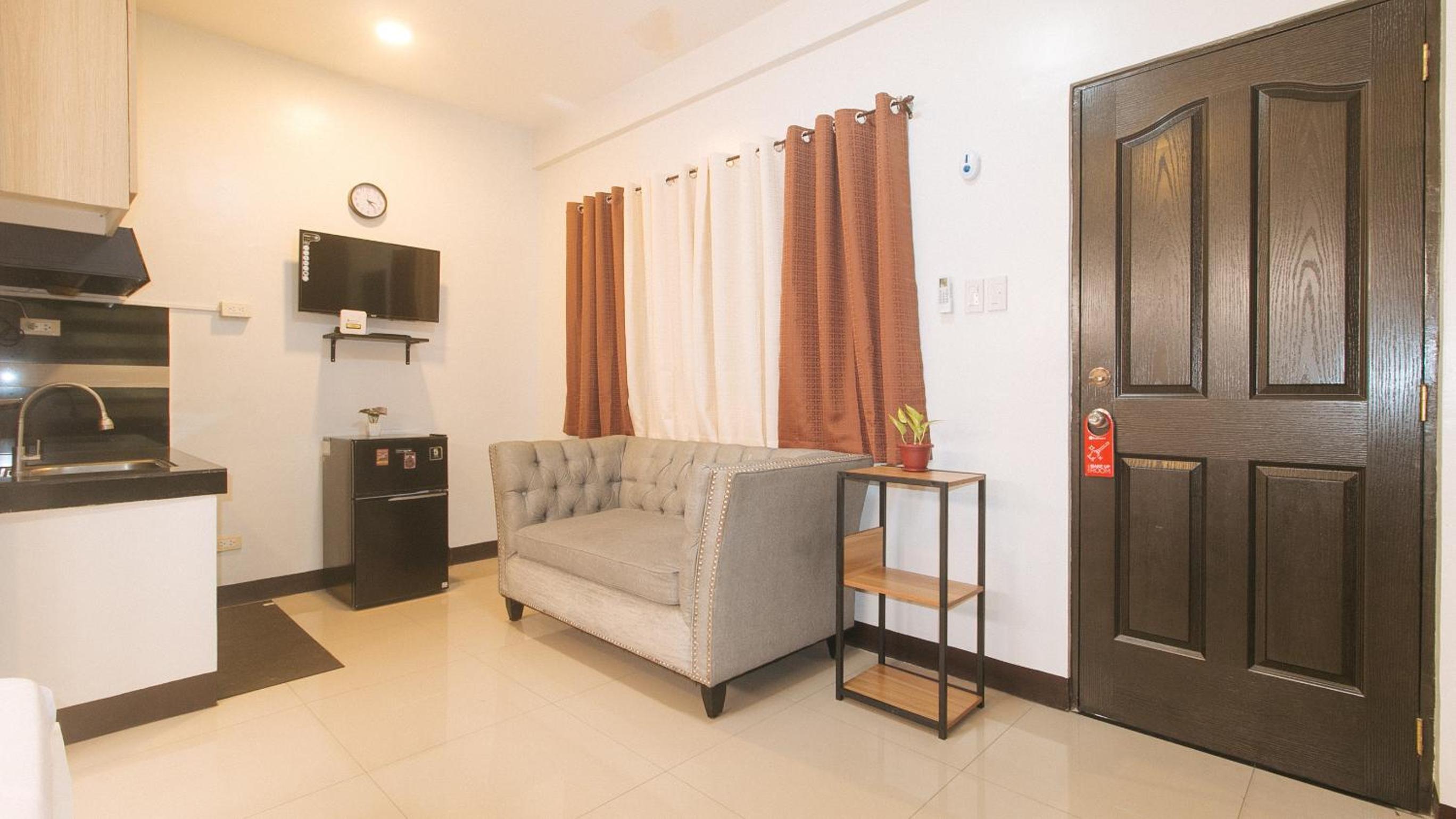 Deluxe Triple Room - Photo 11