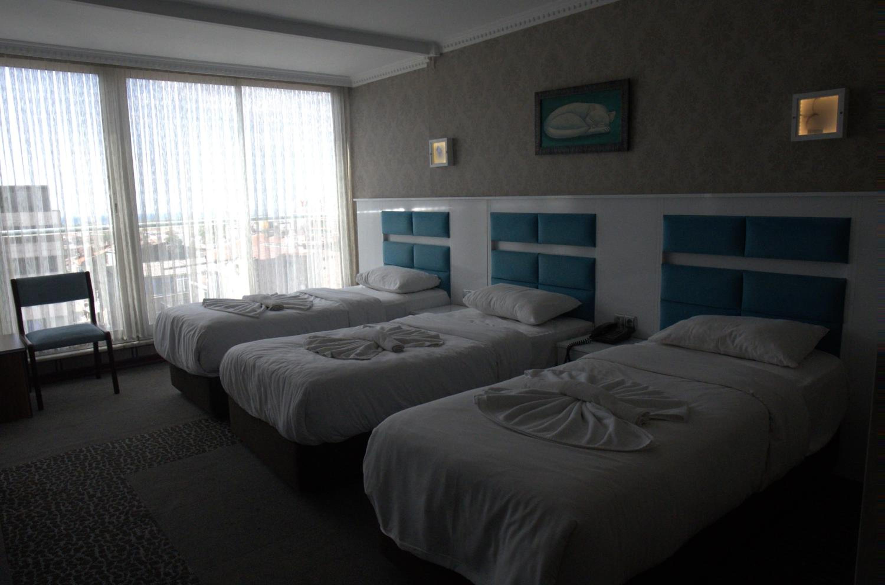Economy Triple Room photo 1