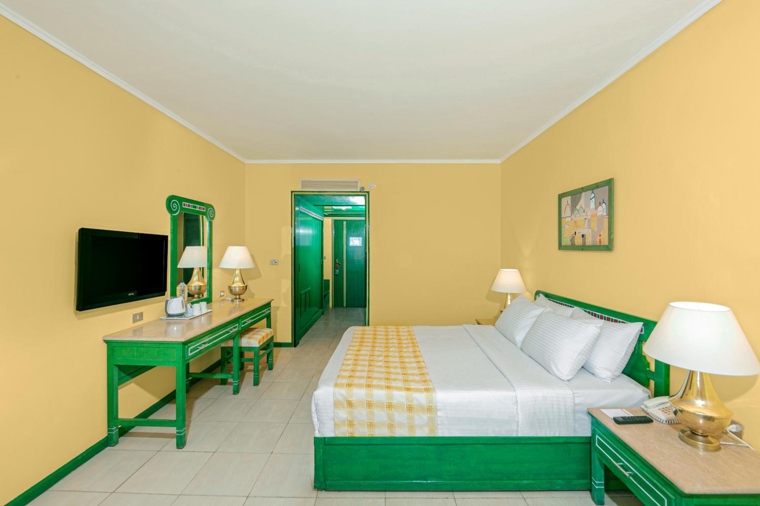 Standard Double Room With Extra Bed And Partial Sea View