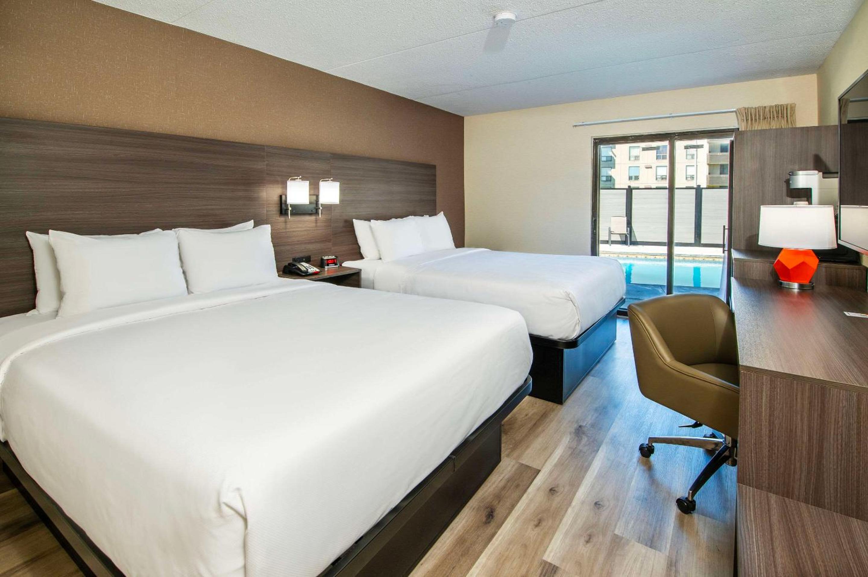 Queen Room with Two Queen Beds - Photo 1
