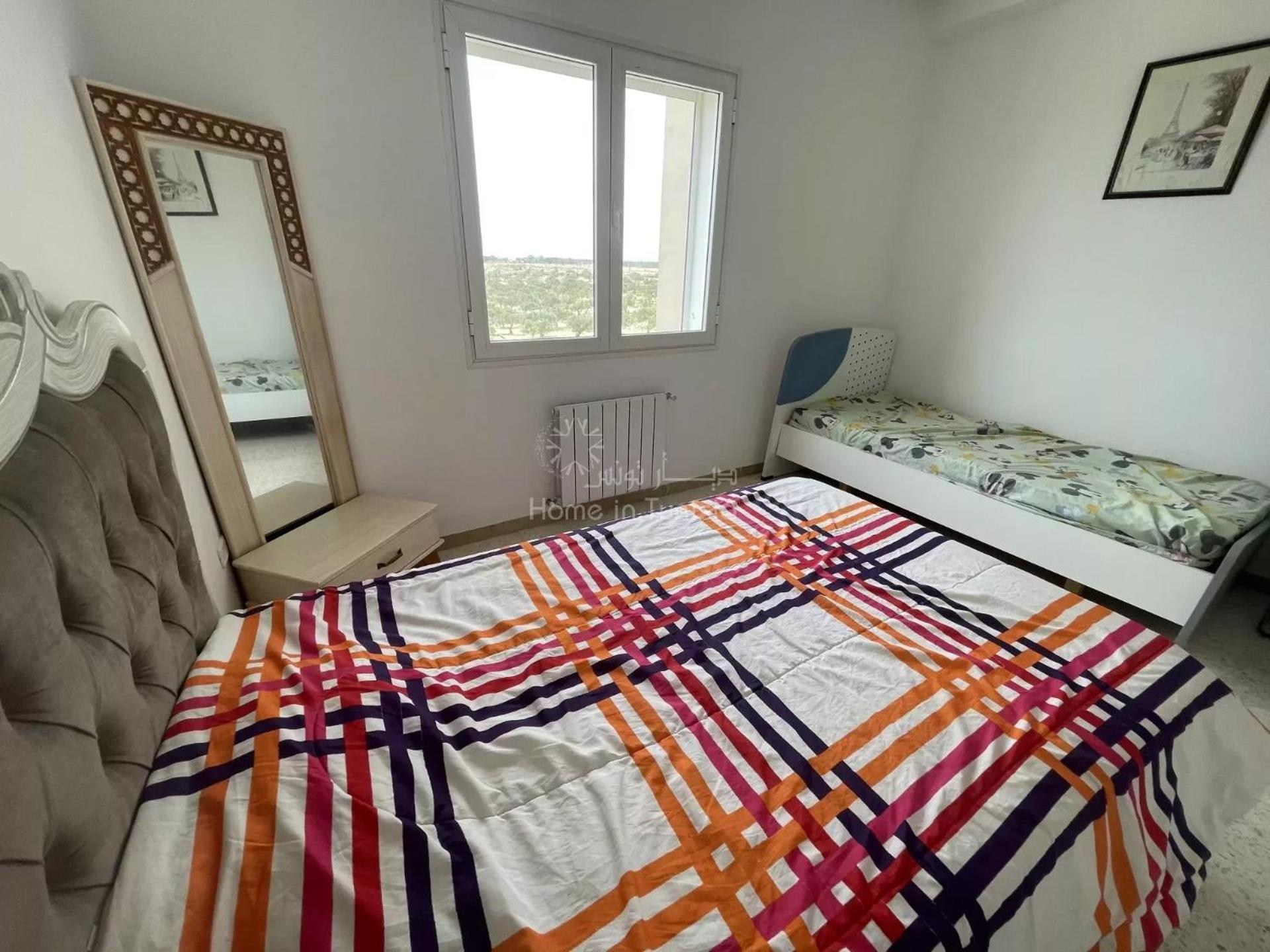 Three-Bedroom Apartment photo 2