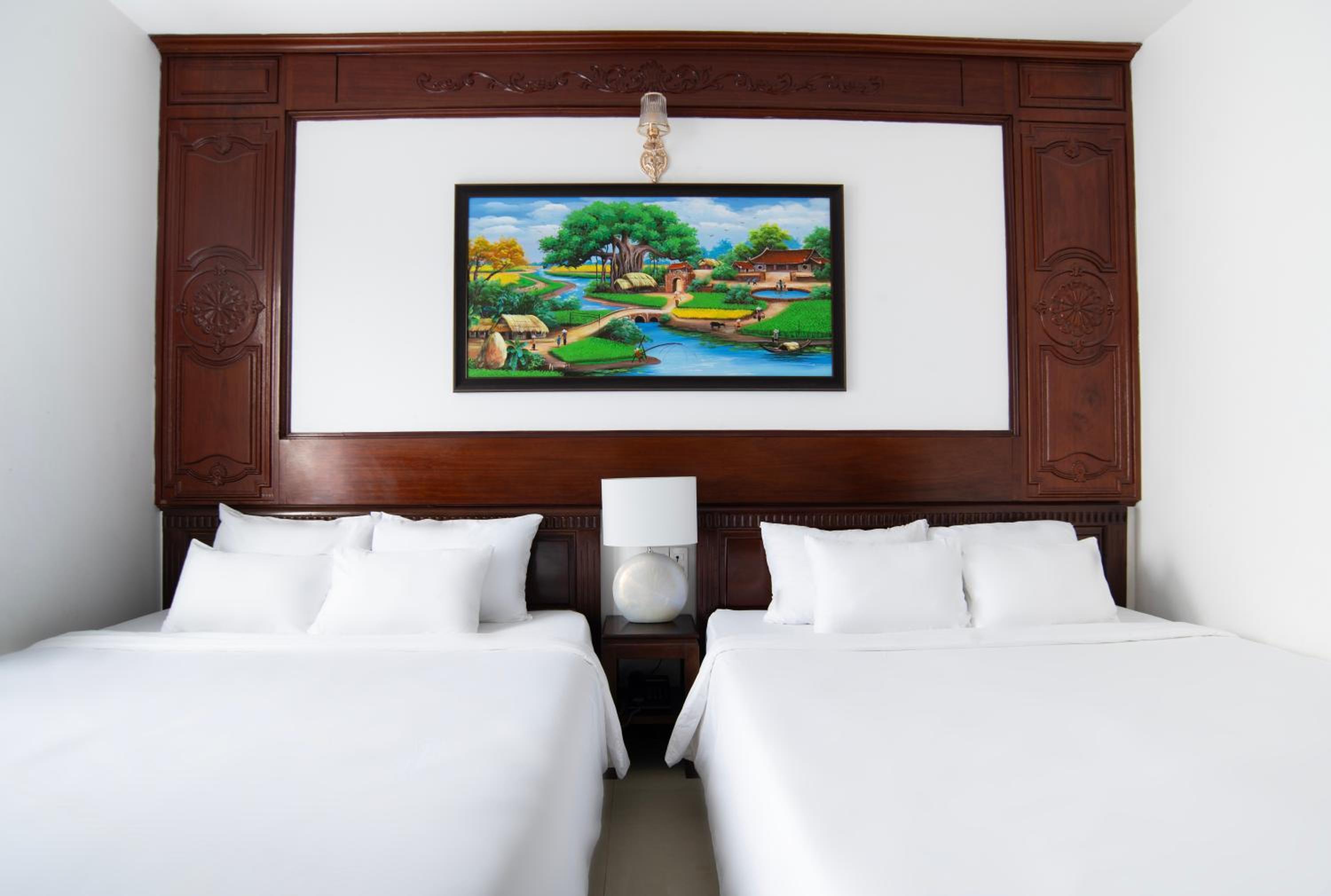 Standard Quadruple Room - Photo 11