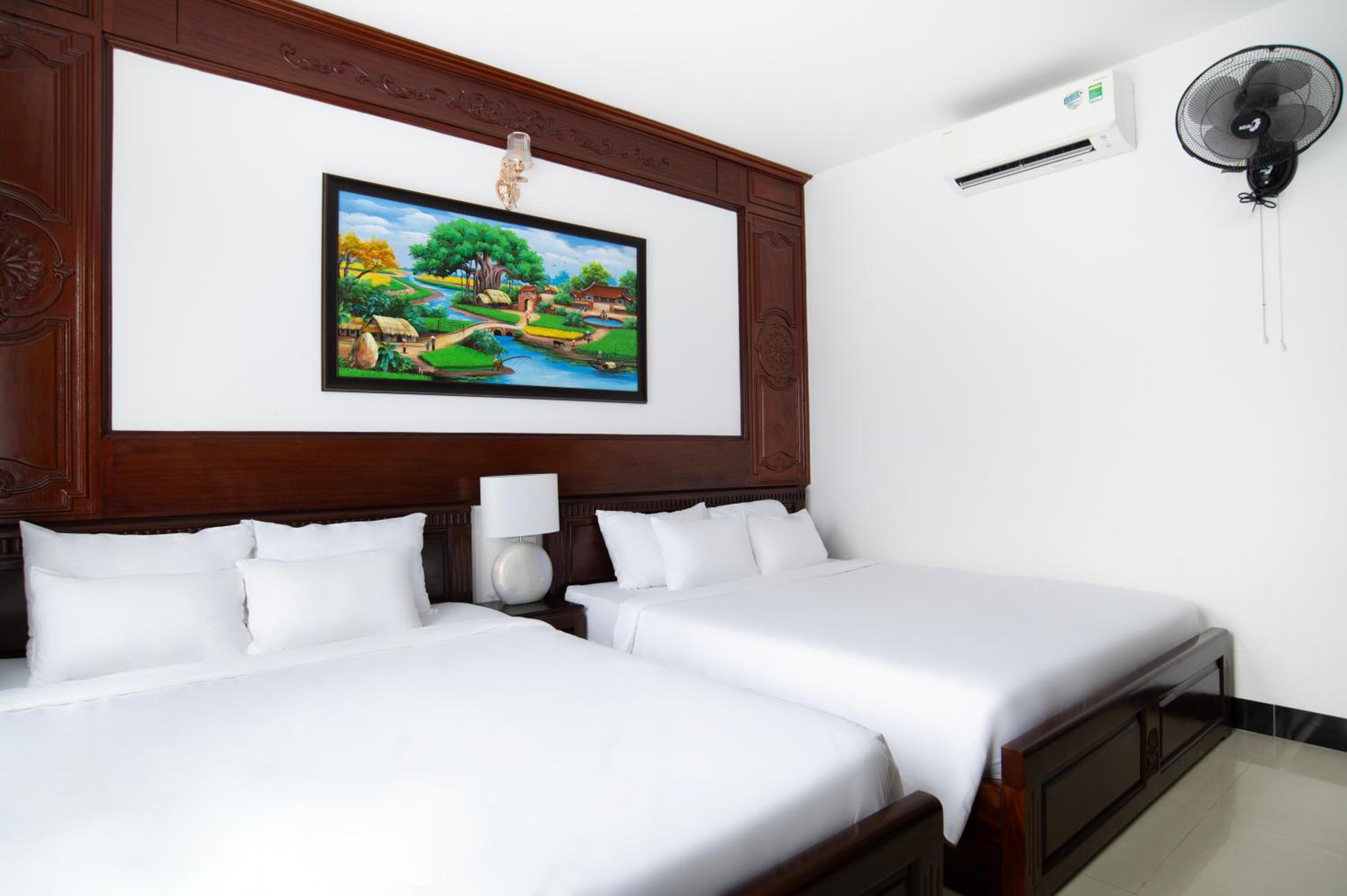 Standard Quadruple Room - Photo 10