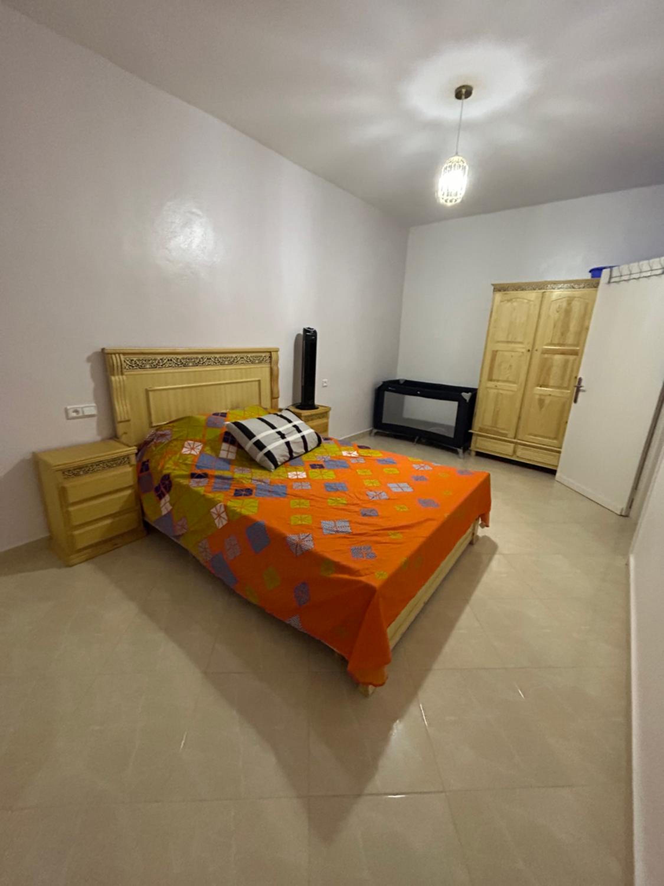 Three-Bedroom Apartment photo 1
