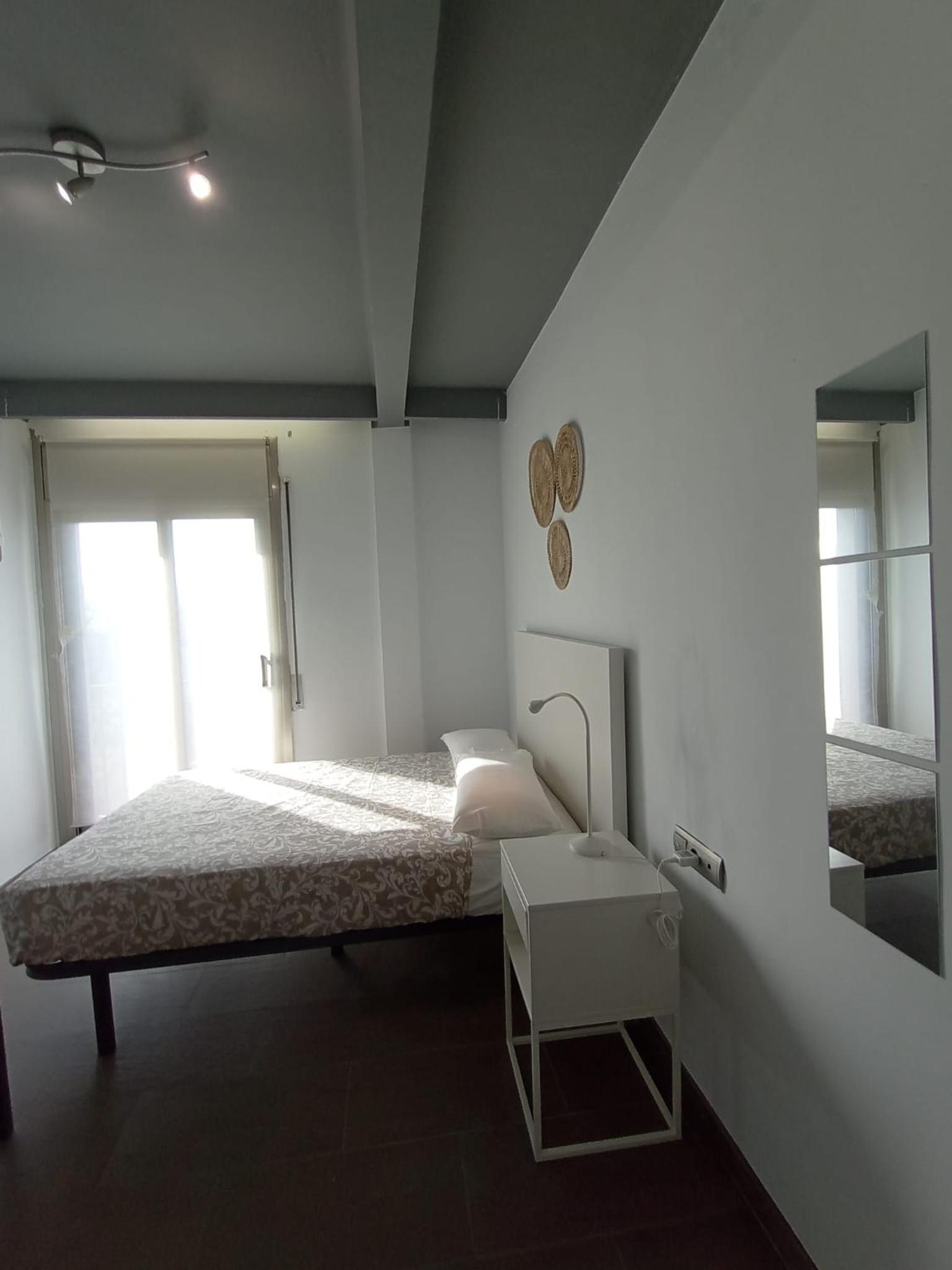 Habitación Cuádruple con Baño Compartido