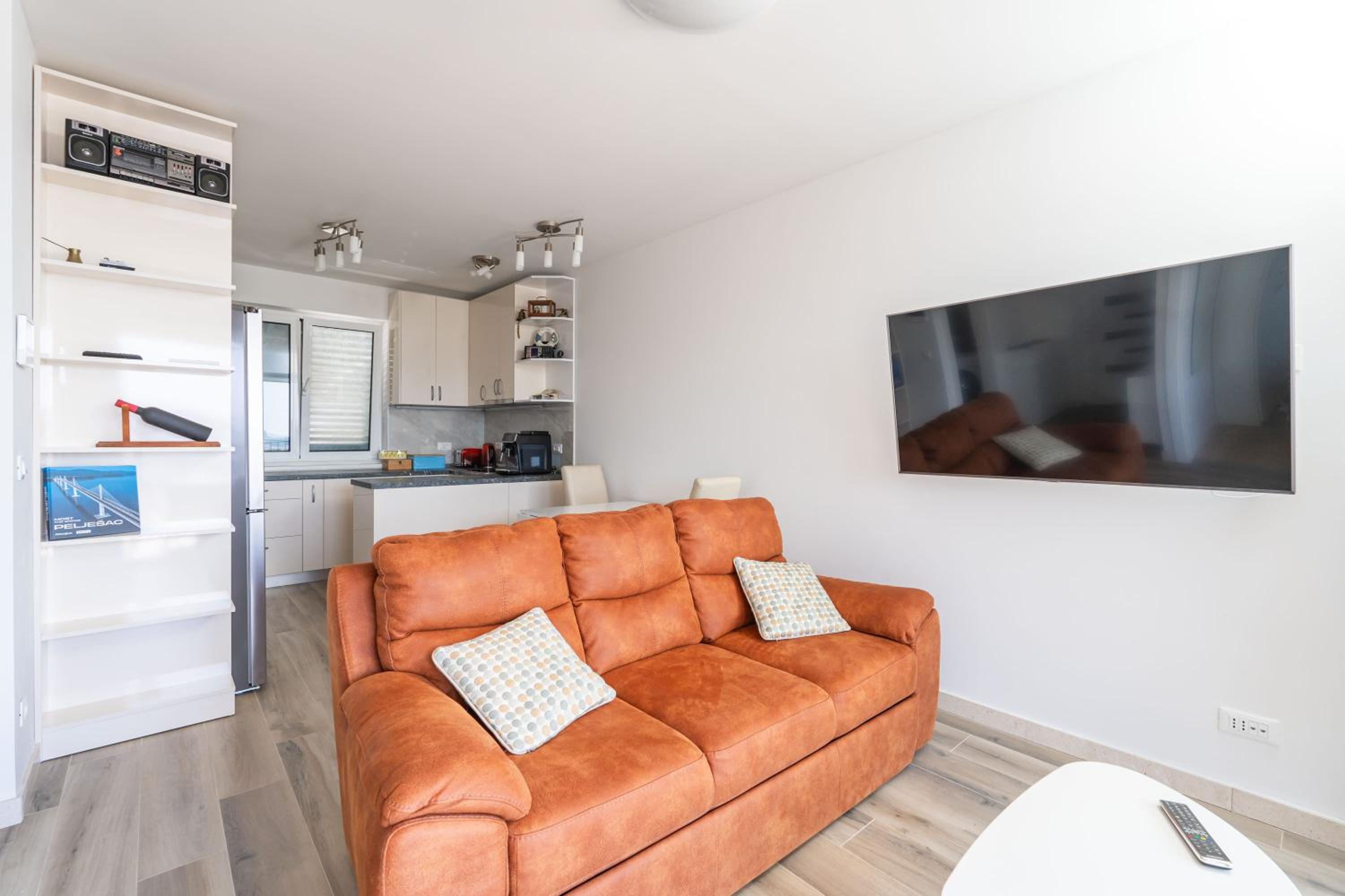 One-Bedroom Apartment with Balcony and Sea View