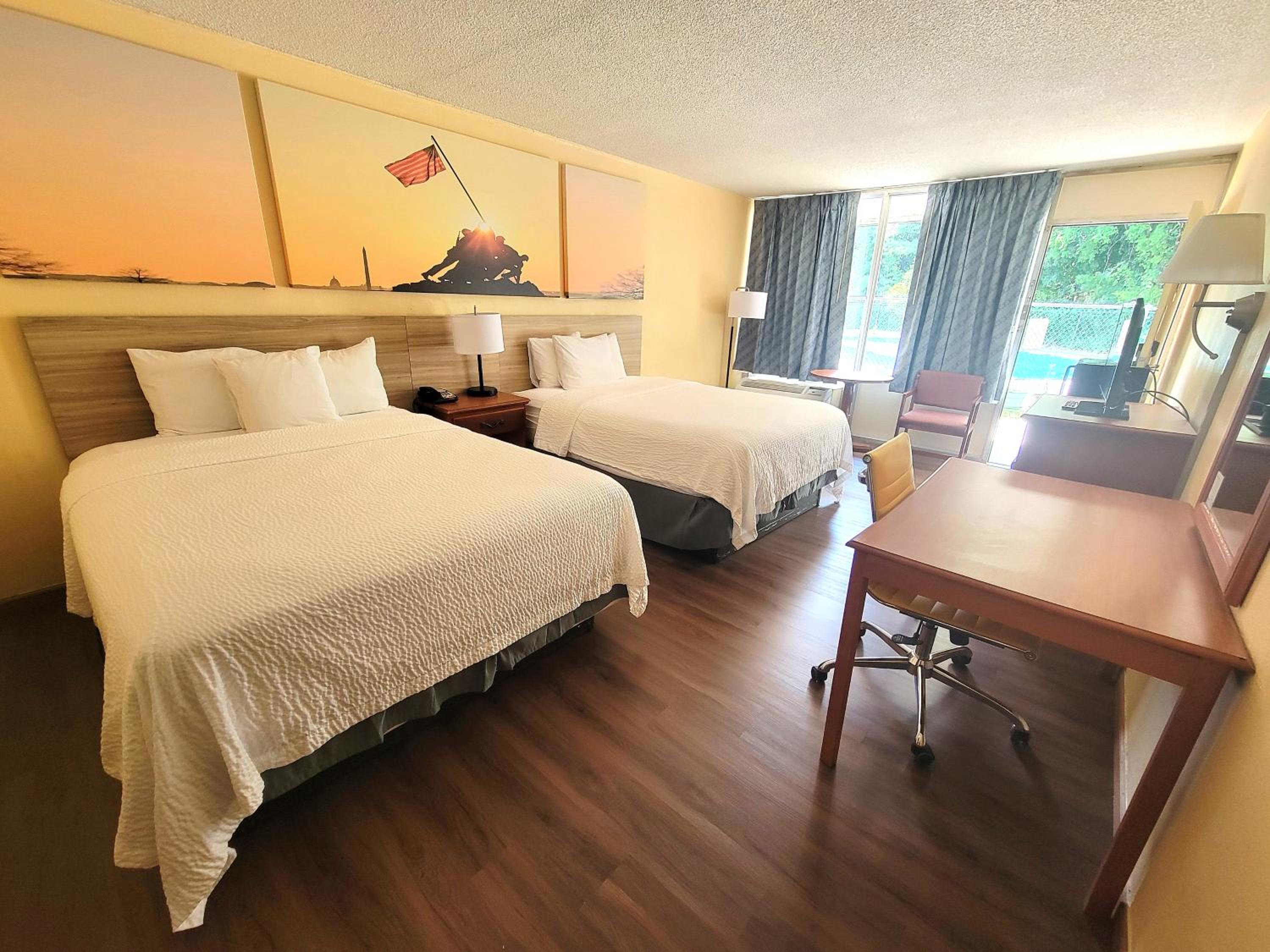 Queen Room with Two Queen Beds - Non-Smoking - Photo 1