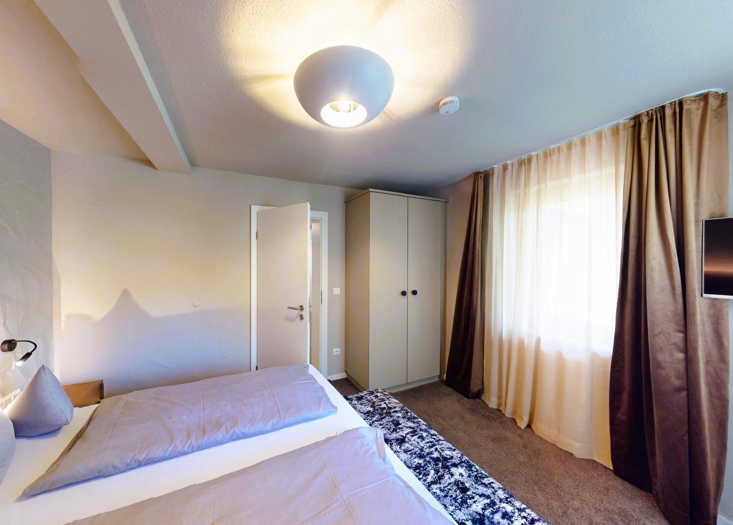 Three-Bedroom Apartment with Balcony photo 2