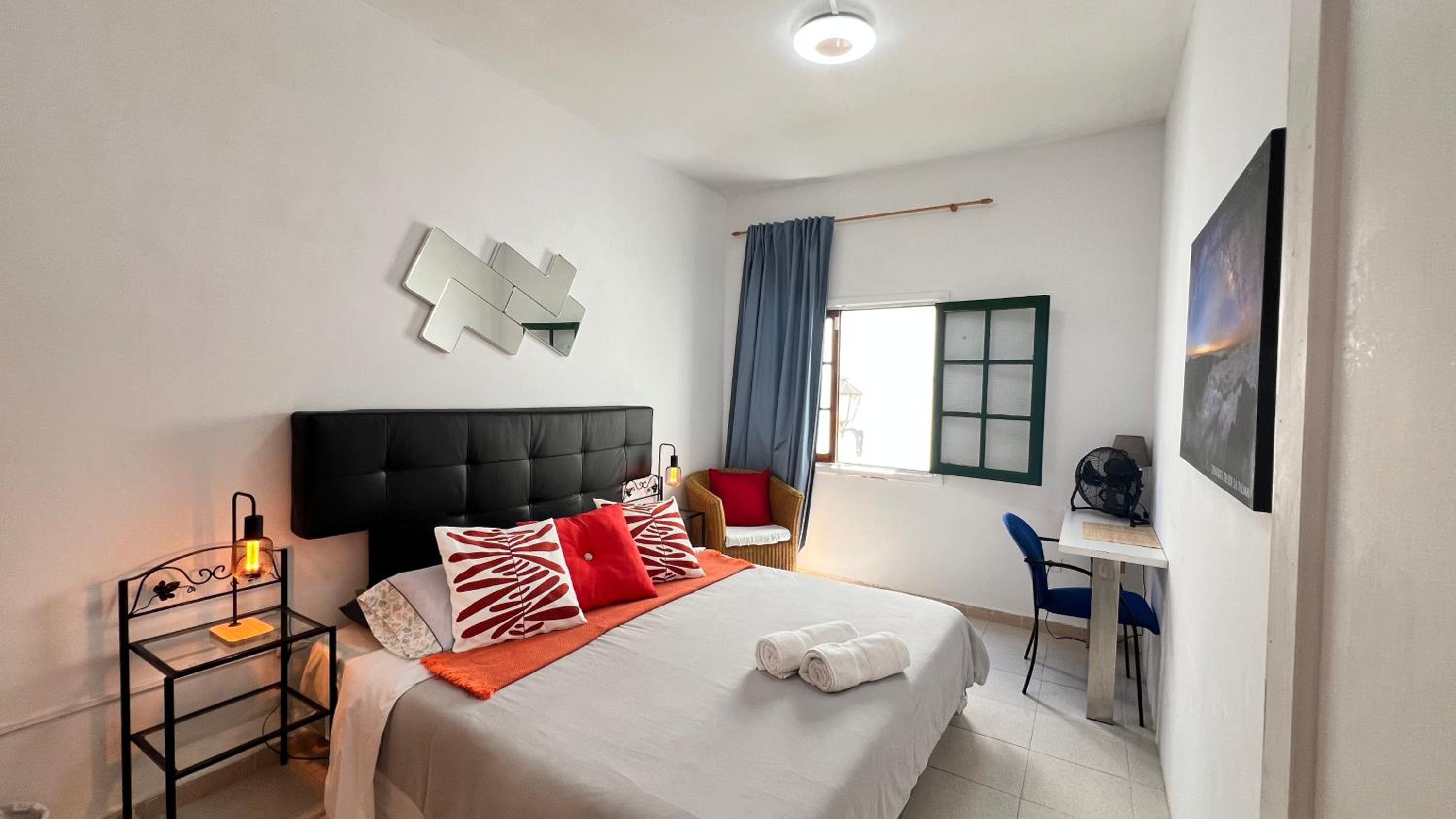 Habitación Queen con Baño Compartido