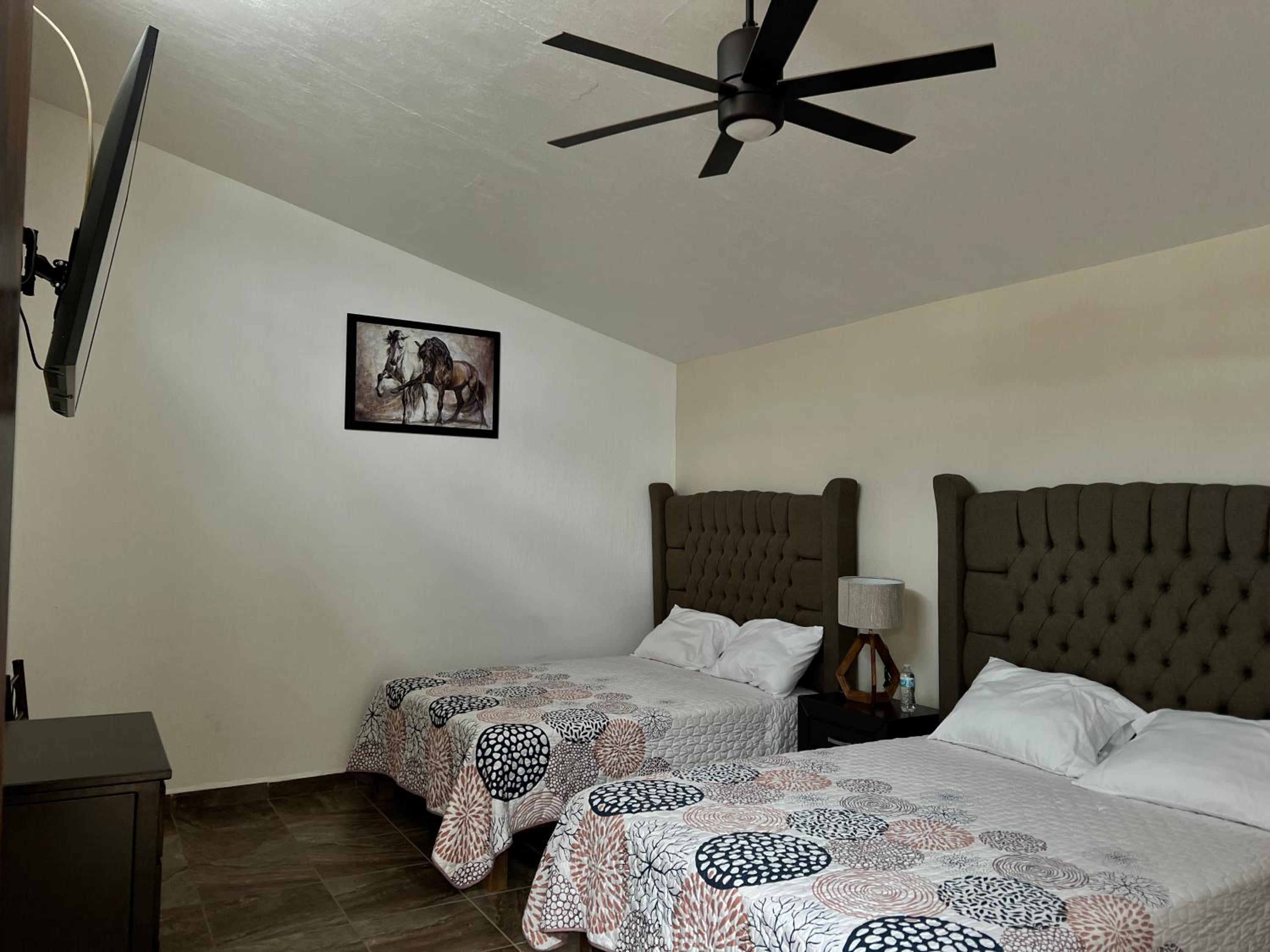 Deluxe Queen Room with Two Queen Beds photo 2