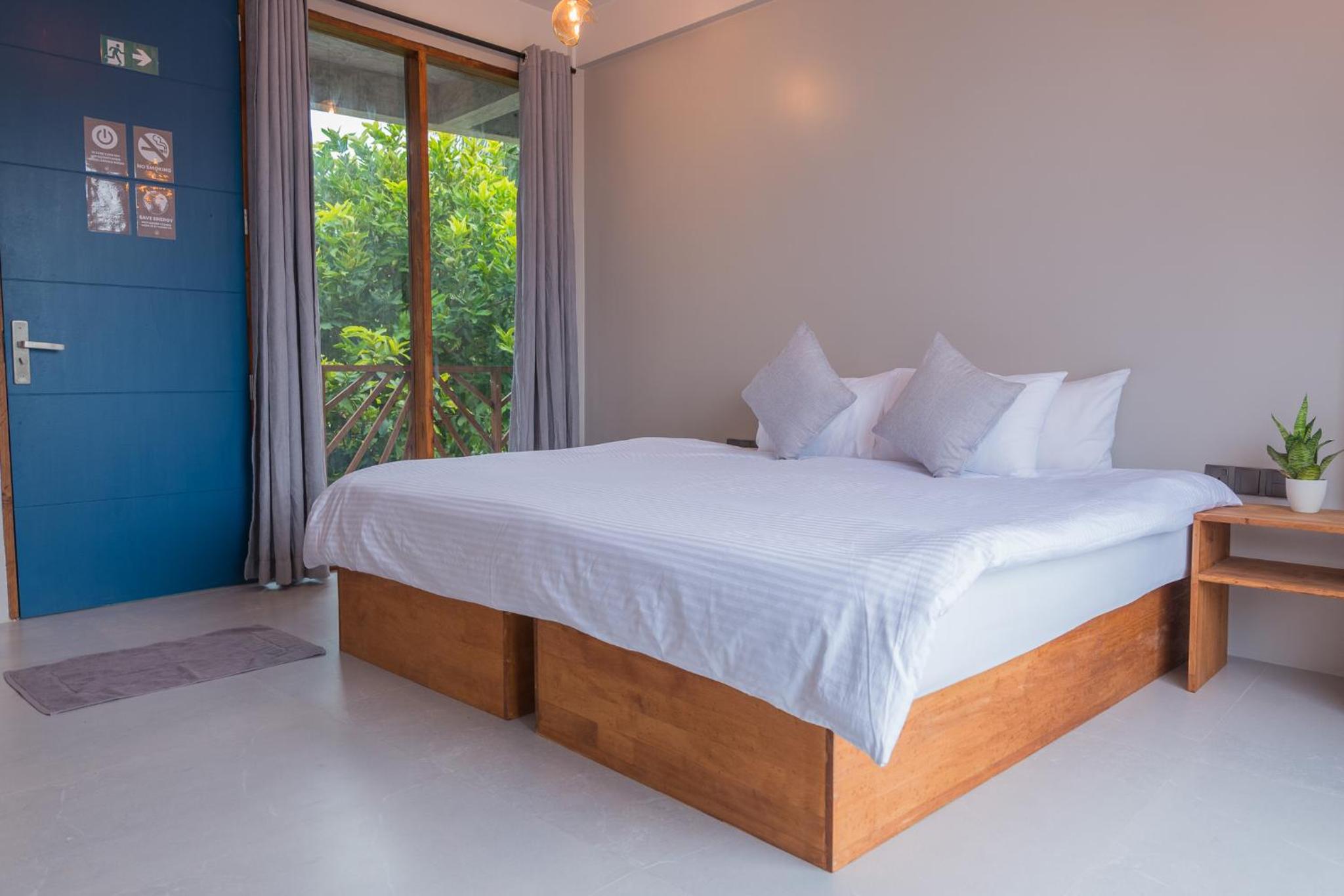 Quadruple Room with Balcony