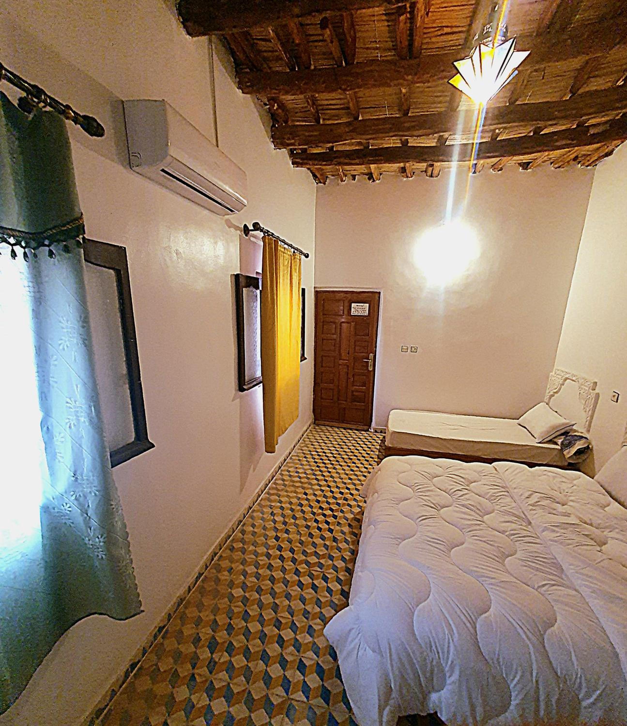 Triple Room with Private Bathroom photo 3