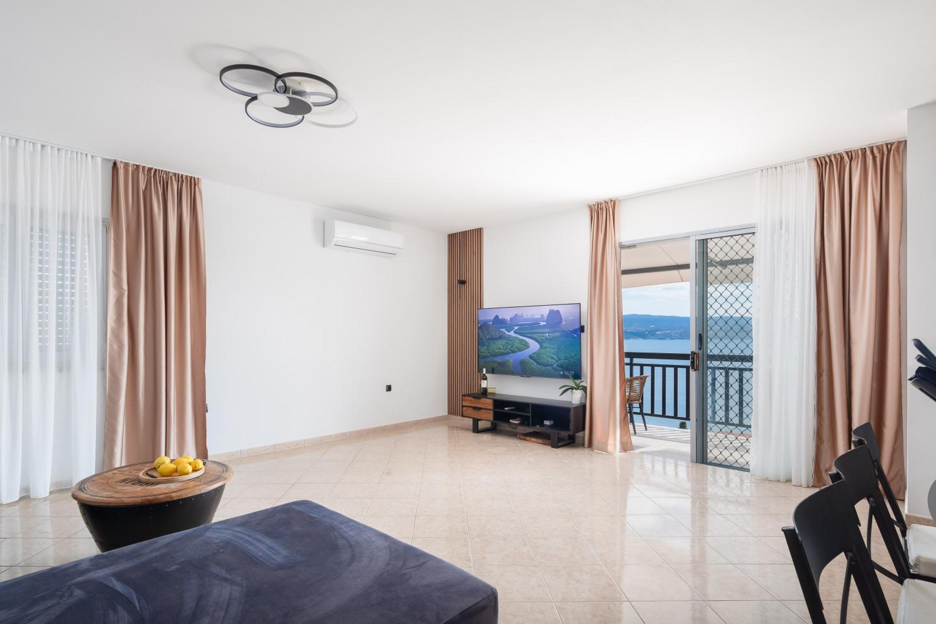 Three-Bedroom Apartment with Sea View