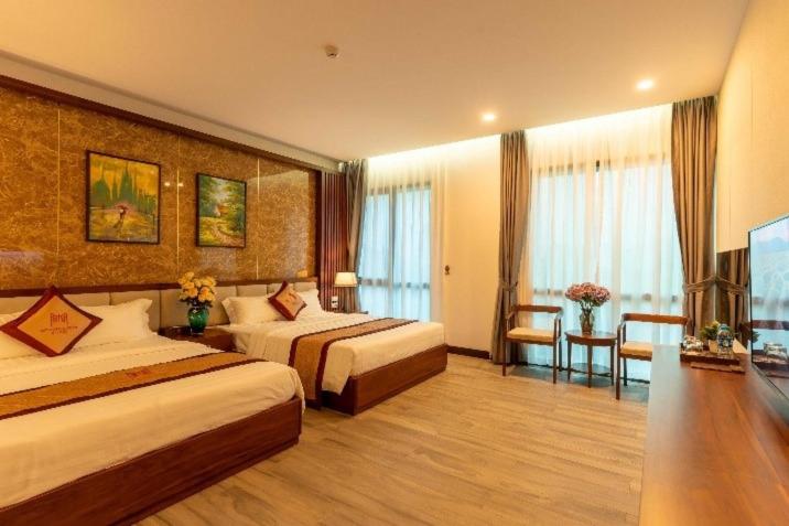 Deluxe Queen Room with Two Queen Beds photo 1