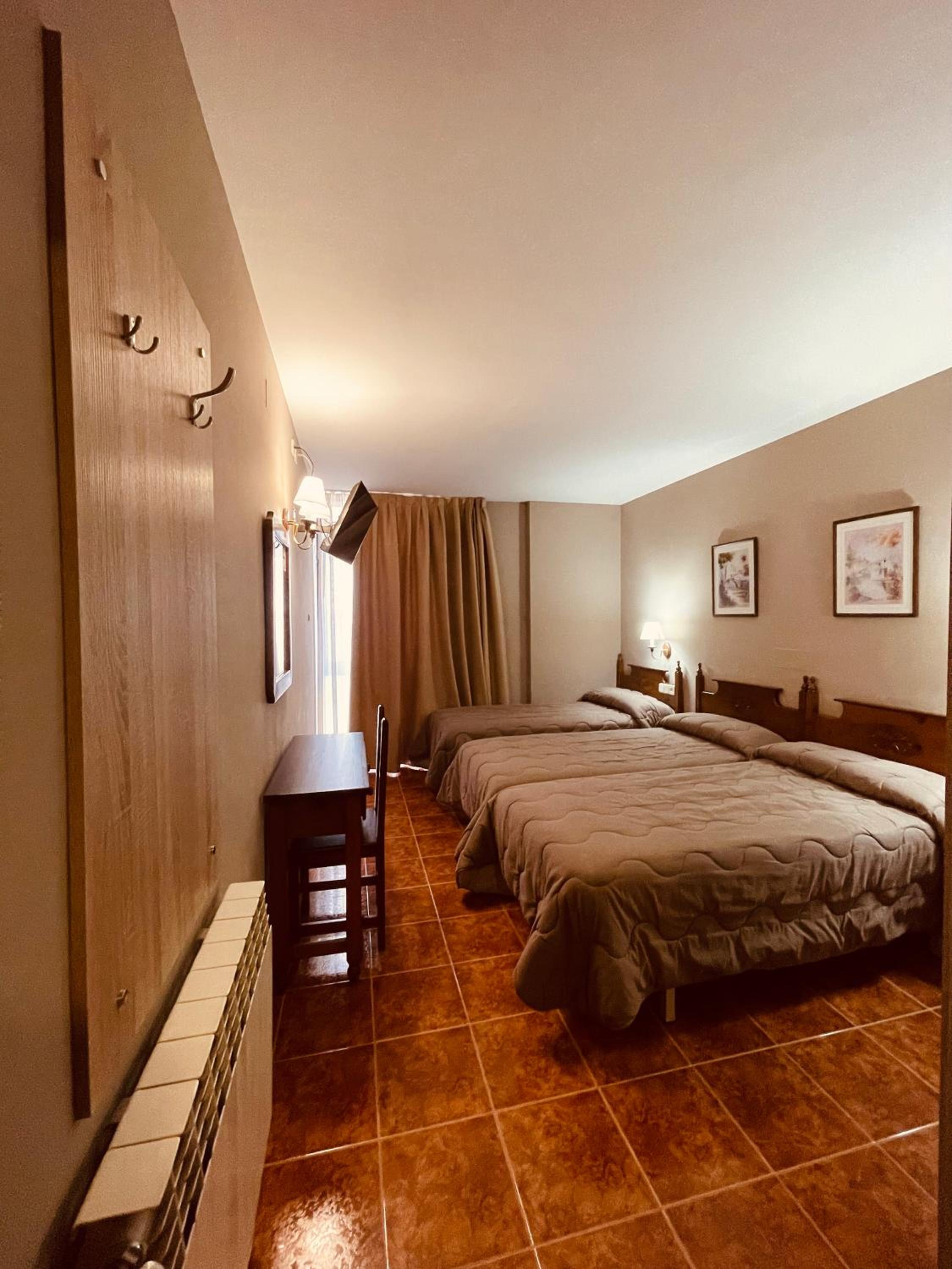 Habitación triple (2 adultos + 1 niño)
