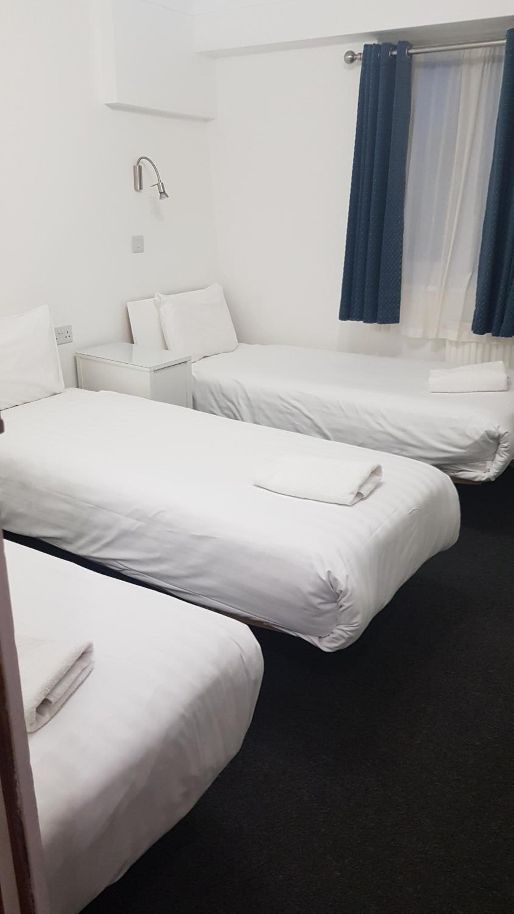 Basic Triple Room – Shared Bathroom Facilities photo 3