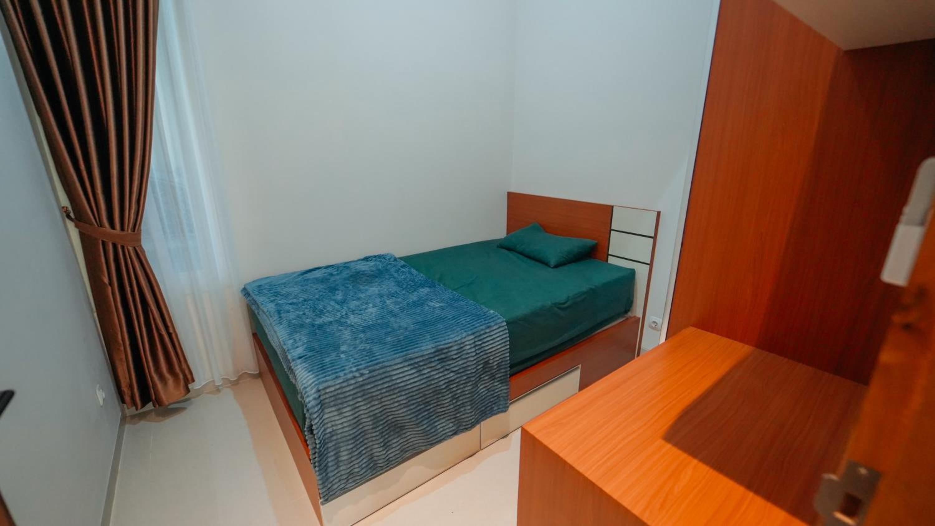 Three-Bedroom House photo 1