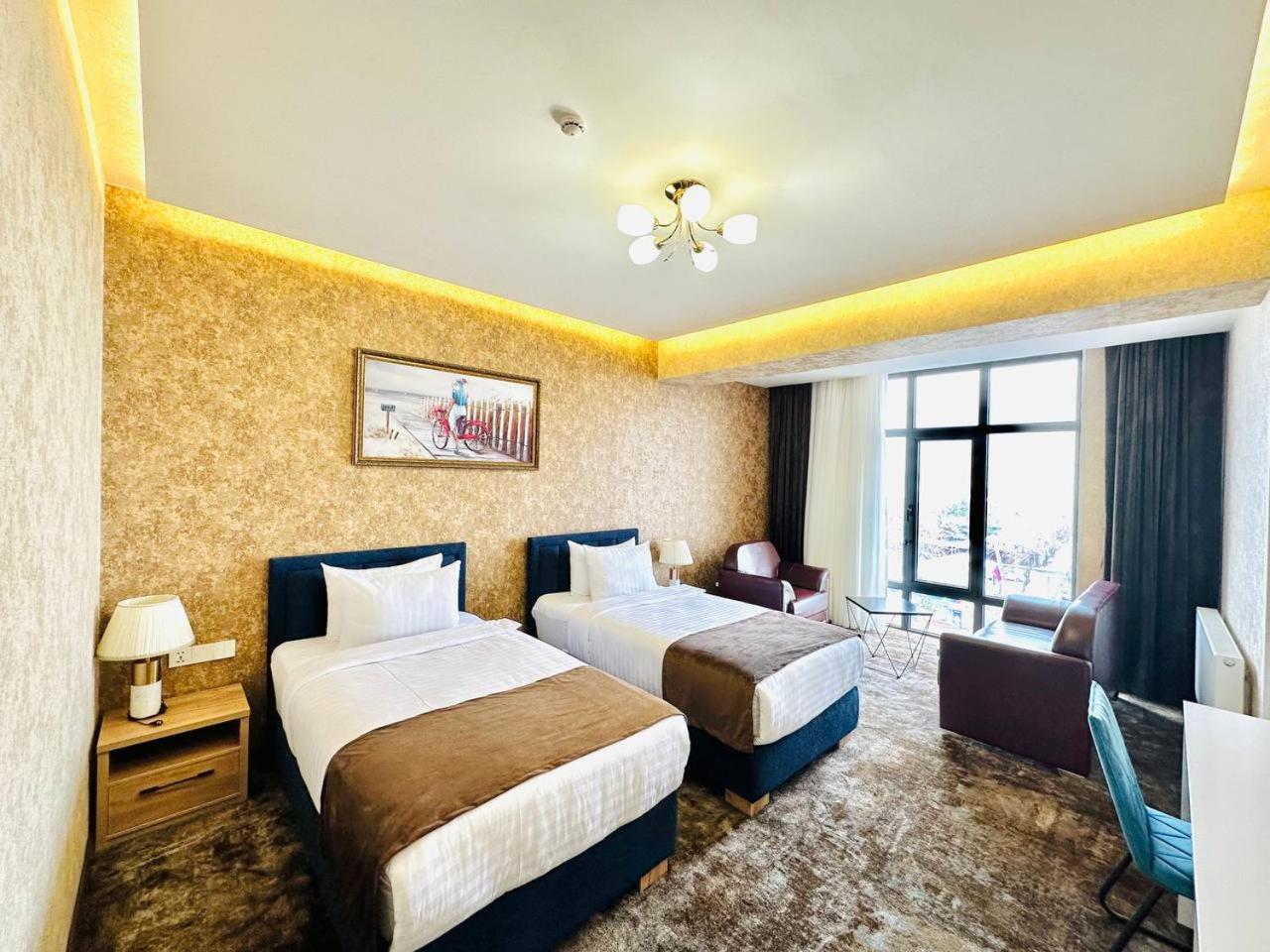 Standard Twin Room - Photo 1